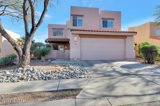 Beautiful home in perfect location with amazing views in every way!  Located in the Catalina Foothills near premium District 16 schools and in a gated community. This property features a nice open floorplan, one bedroom and full bath downstairs, 3 bedroom and 2 bathrooms plus loft upstairs. The master bedroom has beautiful city views a fireplace, large walk in closet and a great nice bathroom with separate shower and tub.  Formal living and dining, a nice kitchen that opens up to a fam. room or extra eating area with a second fireplace.
Private back yard with nice vegetation 
 and amazing views! Won't last!!