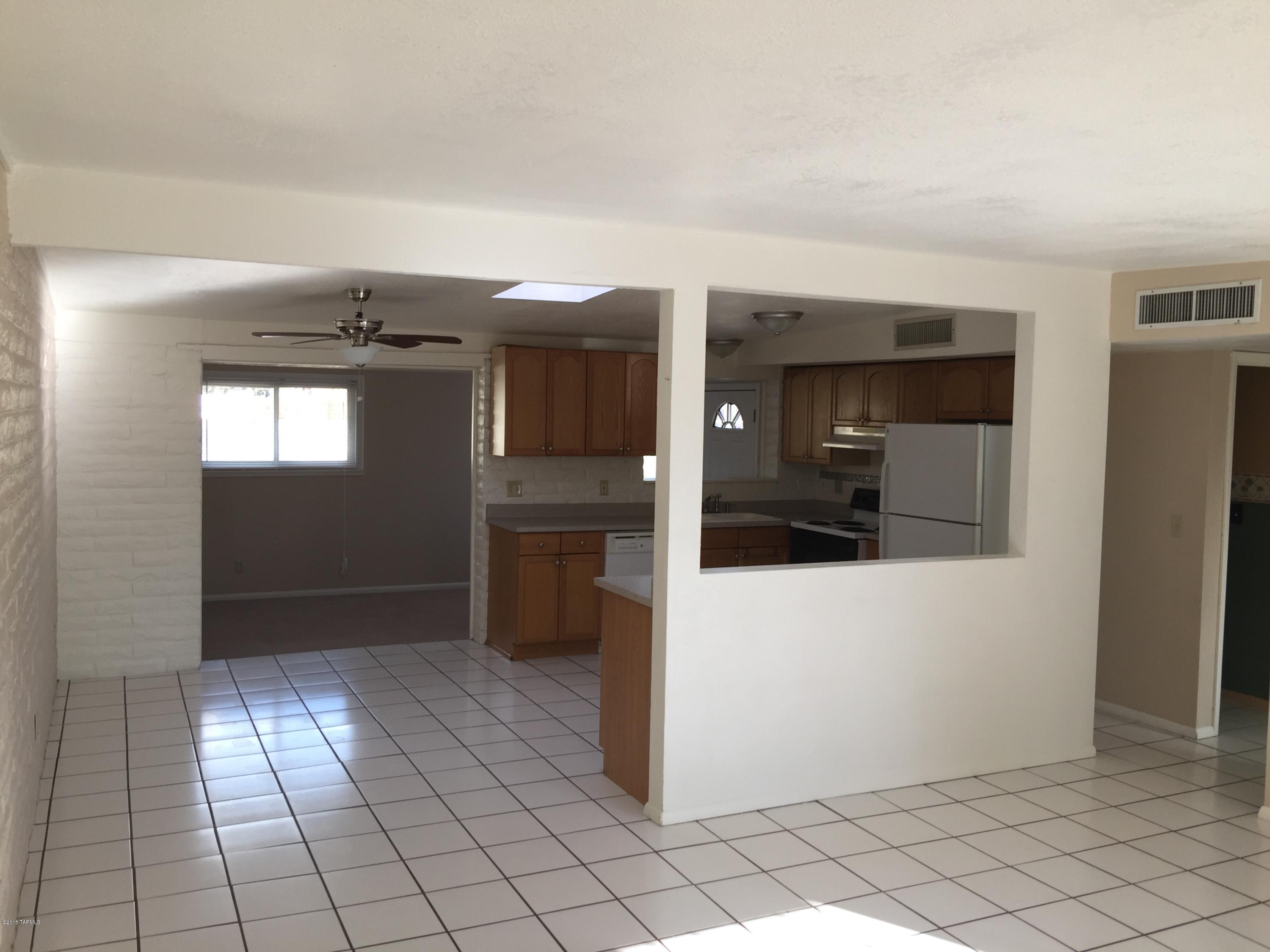 4433 South Evergreen Ave Tucson AZ 85730. 3 bedroom 2 bath single family house.  Open floor plan with new efficient windows and AC. Bonus room on the back of the home is not included in the square footage. Gate from alley to backyard for additional parking.