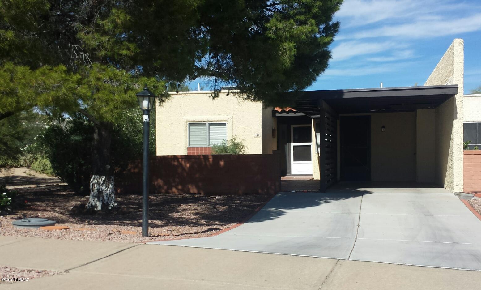 Located in the Colonia de los Alamos community in Green Valley, AZ. Restricted to ages 55+, this well maintained 2-bedroom, 1-bathroom townhouse is and end unit with desert areas around the side and backyards. Home has ceramic tile throughout, an updated kitchen & bathroom, ceiling fans, central AC, and an Arizona room that overlooks the backyard desert. Ready for immediate move-in and caring tenants to call their home.