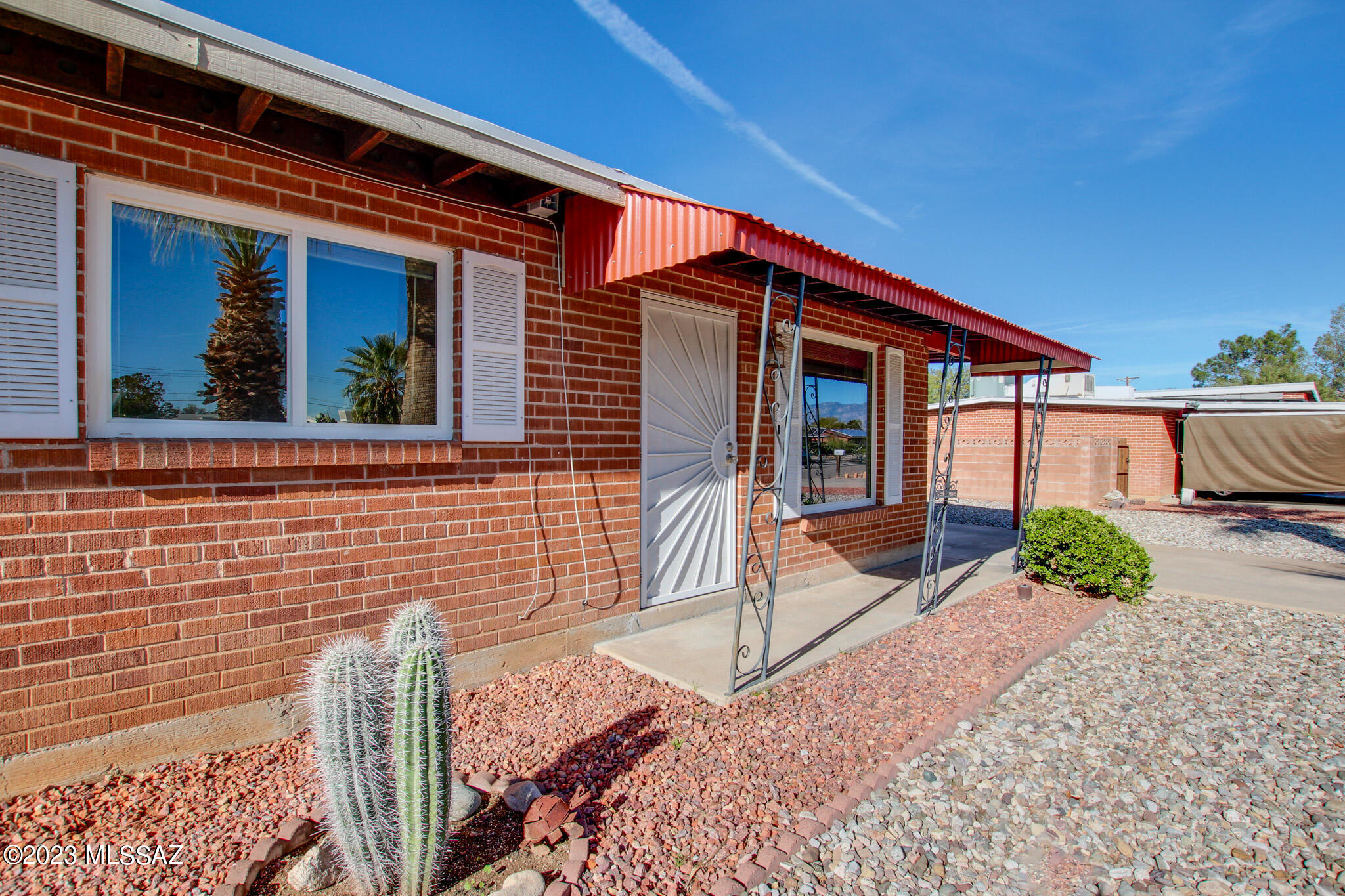 This charming brick 3 bedroom & 3 full bath home has been meticulously cared for. The major systems in this 1957 home recently replaced include the roof & HVAC, air scrubber (added), water heater & dual pane windows along with updated kitchen cabinets & appliances. Bring your toys! There is plenty of parking space, a storage shed, & two utility rooms for all your hobbies. The .2 acre lot has low care landscape & room for a pool! This Eastside home is close to shopping, restaurants & many of Tucson's great amenities.