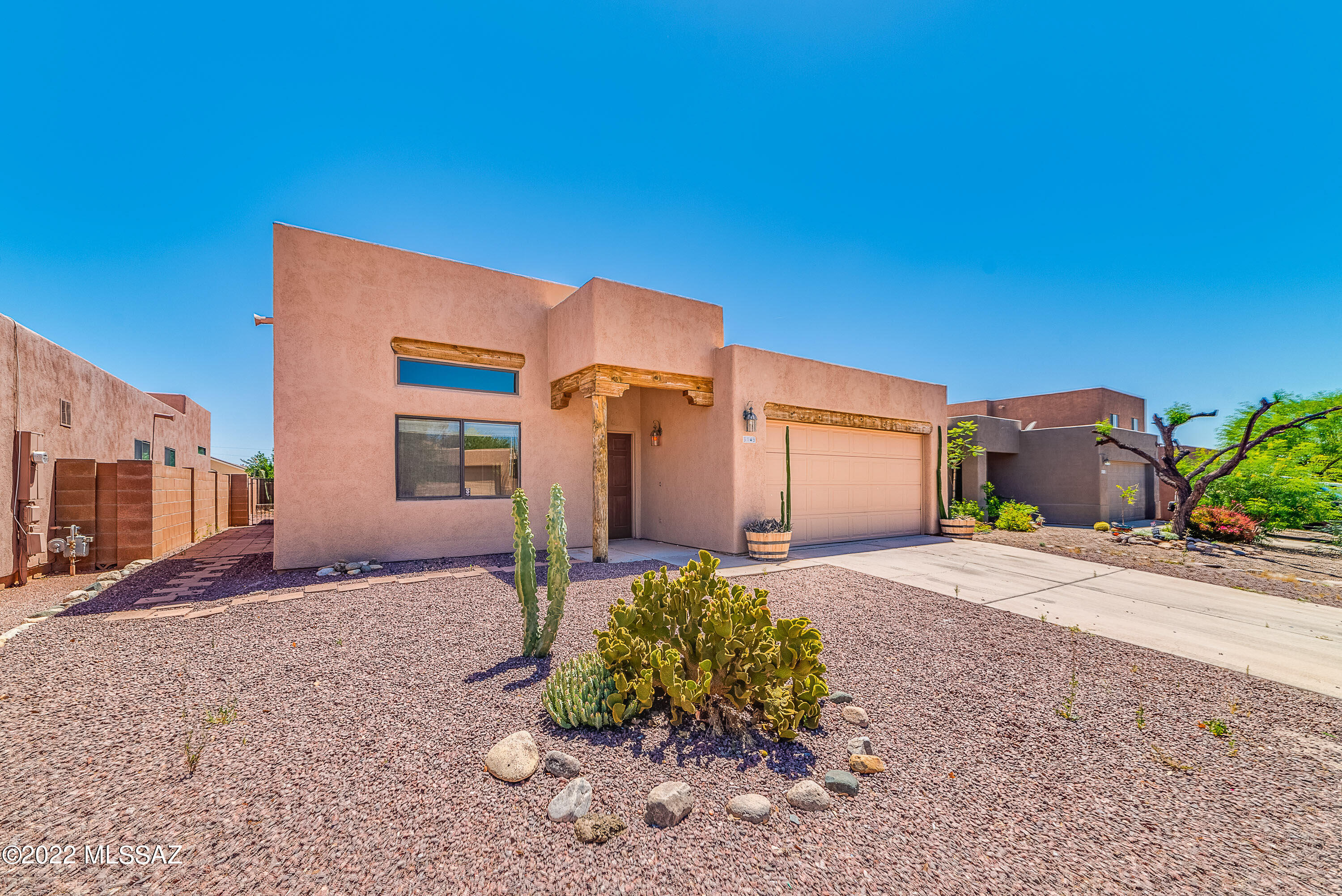 Charming southwestern style home in convenient Northwest Tucson community of Sheva Vistas. This 3 BD/2 BA/1,469 Sq.Ft home has an inviting floorplan w/living area, dining area & family room w/fireplace off kitchen. Kitchen has plenty of counter & cabinet space, island, pantry & stainless steel appliances. Good sized master has a walk-in closet, shower/tub & dual vanities. Backyard has a covered patio, artificial turf & room for your ideas. Lease solar system w/Telsa helps lower electric bills.