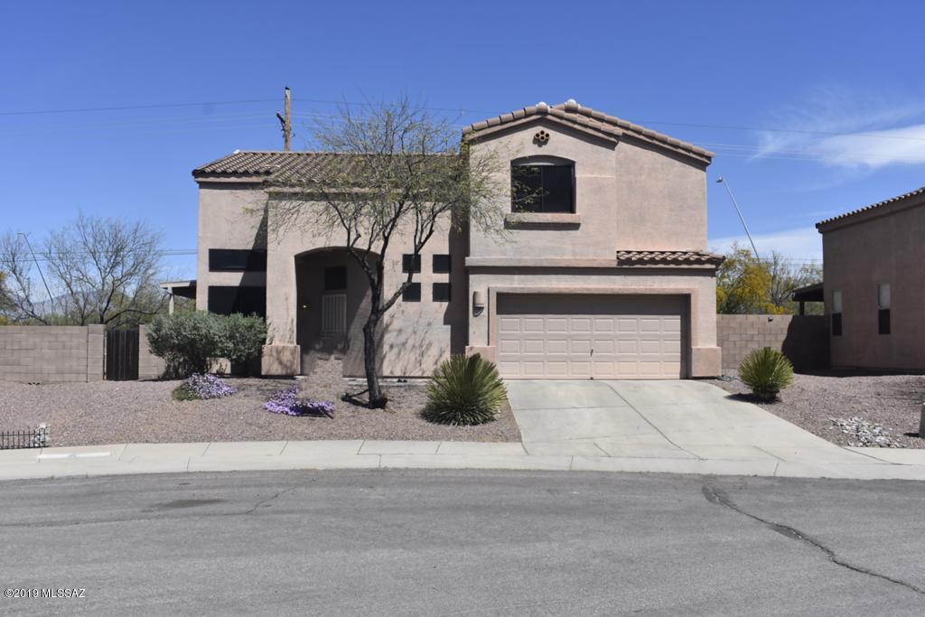 Spacious,Well-Designed and Priced to Sell! Two-Story,2,006 Sq.Ft. 3Bed/3Bath home located in the middle of Beautiful East Tucson! Very nice 2 Car Garage that has a wash up sink so, you do not have dirty hands going inside your New Castle! Only 41 Homes in this, what seems like an Oasis in a well established part of Pima County! Take advantage of this rare availability!!!!
GREAT PROXIMITY, to many of your needs!!! 
 Come pay us a visit, won't you? We think you will be glad you did. LET'S WORK TOGETHER!!!!
P.S. POOL SIZED BACK YARD, yay!!!