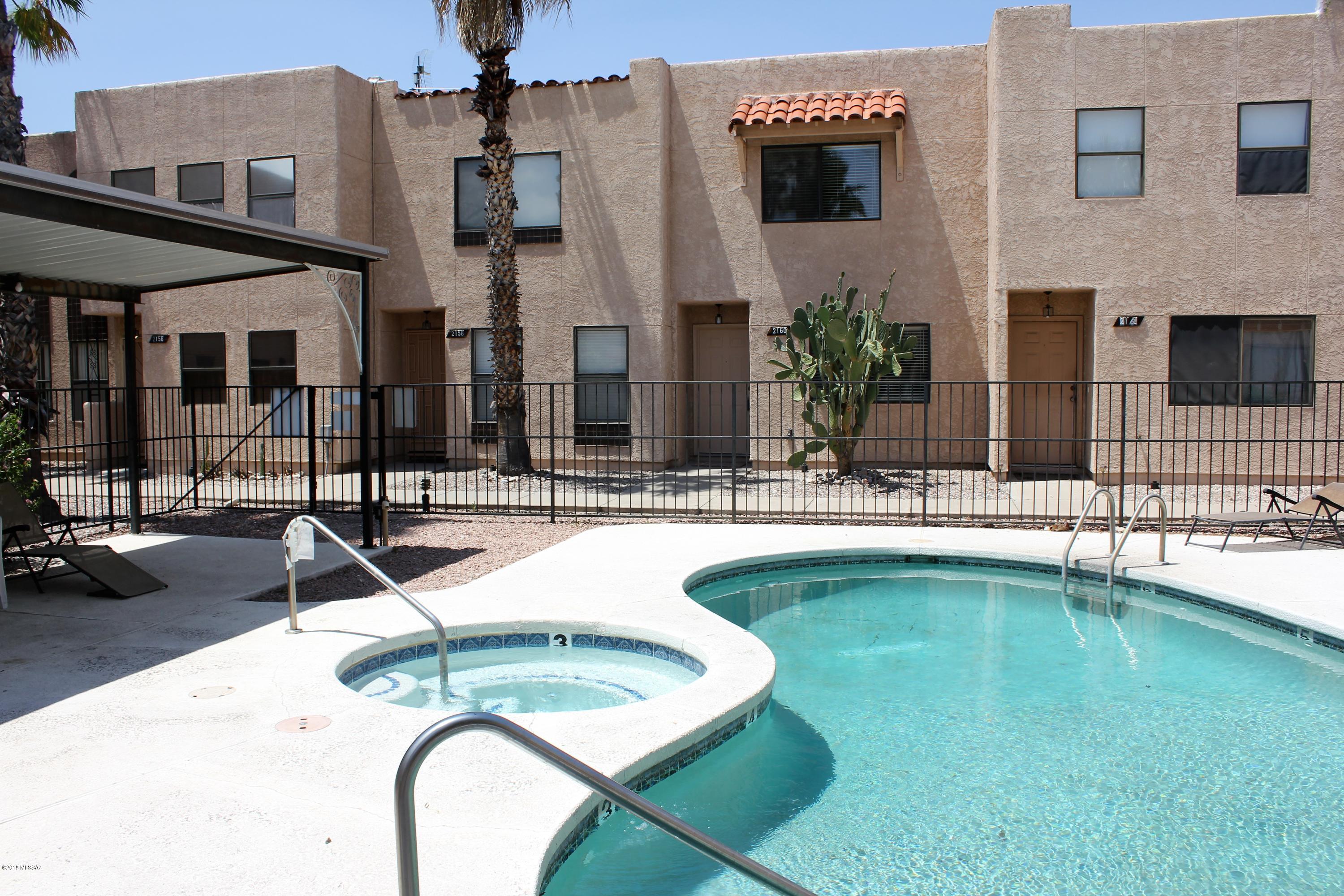 Quiet poolside condo, in a small complex.  Close to the U of A! Close to Banner Medical Center.  Close to Downtown.  Ready to move into. Close to many conveniences! This fresh bright home features new carpet, new tile! New ceiling fans in the living room and kitchen! Eat in kitchen! Fresh paint! All the appliances! Dual pane windows. Skylights.  Bathroom downstairs too!    Great for serious student, grad student or young professionals. Nice investment.  Always rented within a few days!Ready to move into!