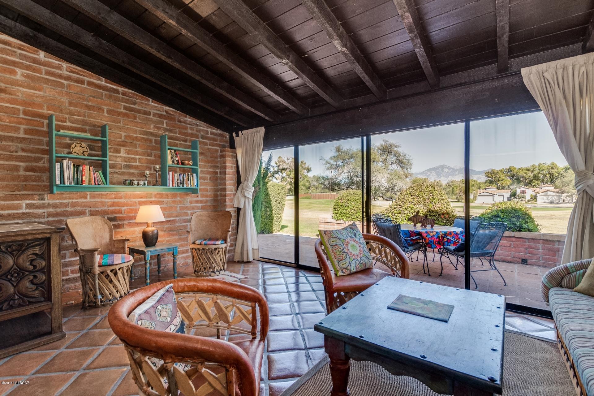In the heart of the Tubac Golf Resort, this Centro Villa on the 9th fairway of the Otero course has an excellent view of the Santa Rita Mountains from the back patio. The front gate brings you through a private front courtyard and into a great room with with living, dining, kitchen, and fireplace. The two separate bedroom suites each have full baths and plenty of closet/storage space. It's location in the villas provides easy access to the garage which is great for luggage and groceries. Pool and laundry are just outside your front door.