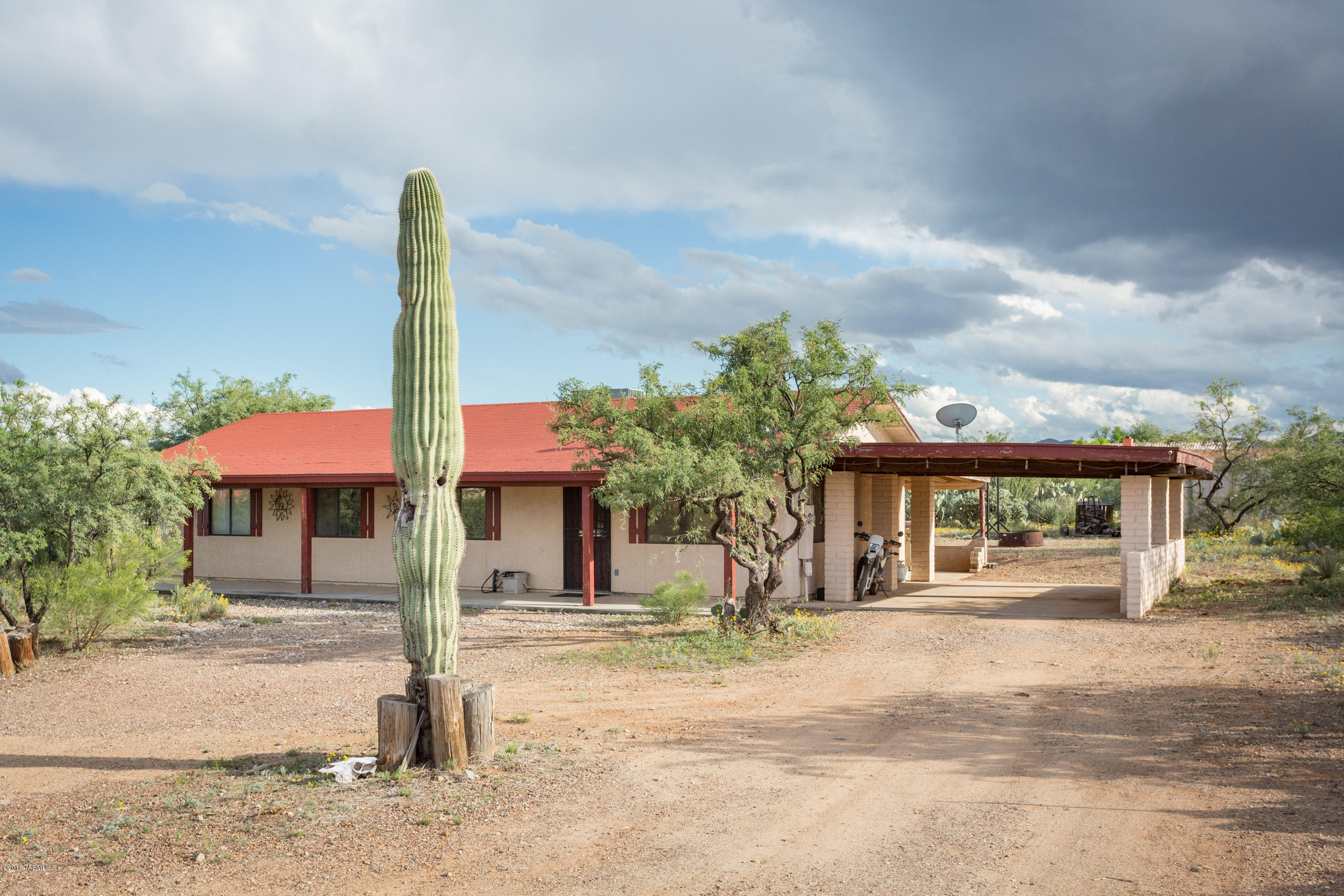 Relax & Enjoy this 2 Bed 2 Bath 1152 SqFt Ranch style home on just under an acre oozing with rustic charm! 360 degree views with privacy & space Located in the desired A+ Vail School District. This home boasts Saltillo tile floors, fireplace & extended covered back patio for year-round entertaining. Some horse facilities included & plenty of room for toys or a workshop. Desert landscaping, no HOA & all the convenience of Rita Ranch just a short trip down the road. A must see!