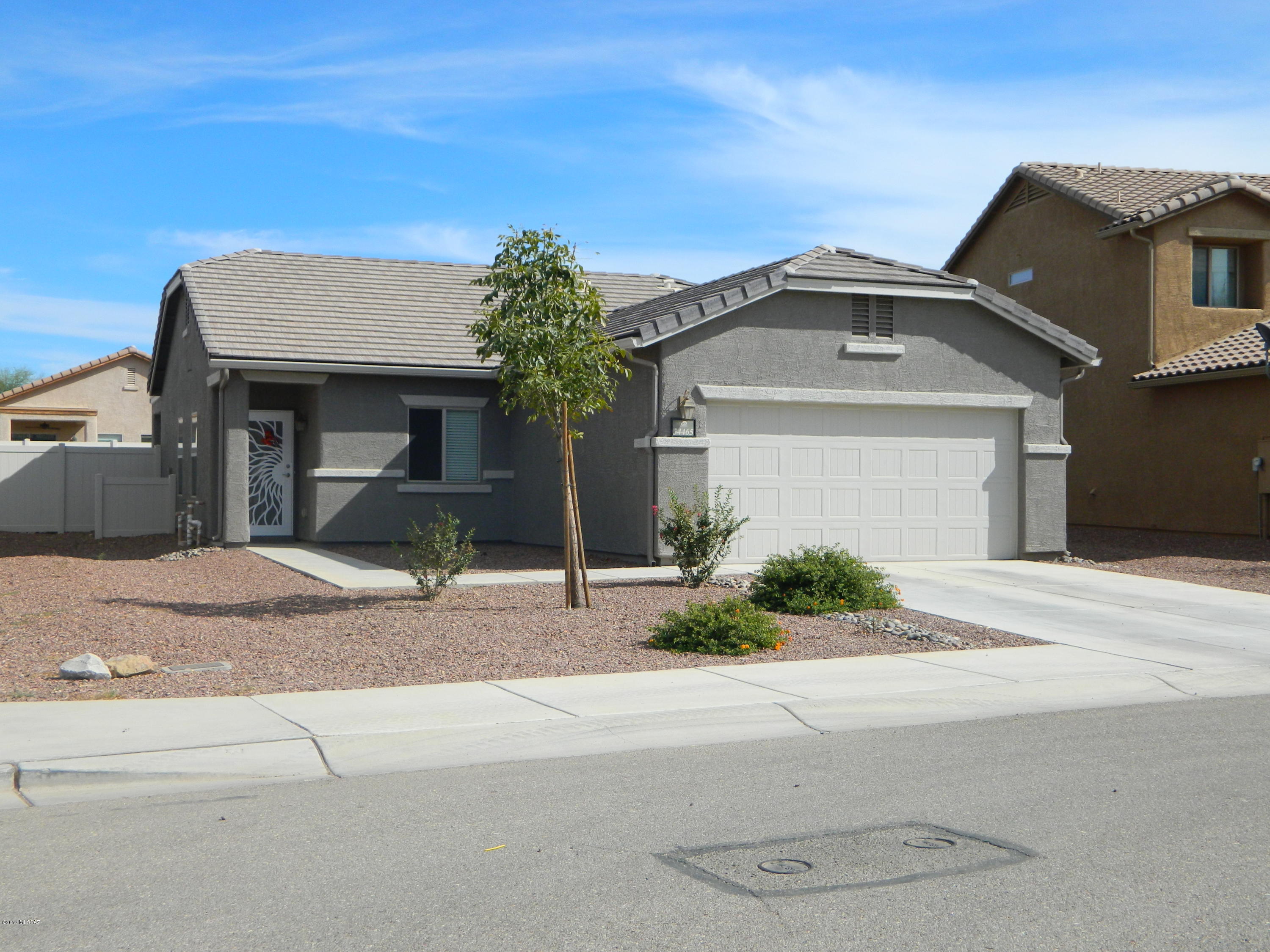 Freshly painted inside and out this well cared for home, offers 3 bedroom, 2 bath, & two car garage.  Perfect for the retiree or a young family.  You will enjoy the amenities such as 2 beautiful pools, playgrounds, ball fields, walking trails & all the beauty that this area has to offer.  Upon entering you will notice, Titan screen security door, gorgeous Pergo (wood) flooring.  The kitchen, bathrooms & hall are tiled for easy care & quick clean ups.  This home provides ample storage plus a laundry room that leads to the garage.  The open kitchen includes stainless appliances and dining area.  The fenced in backyard includes a large patio with, Sun Setter Remote Sun Screen, to enjoy sitting outside anytime. upgraded and large enough for a pool.  This home is an easy keeper.  A must see!