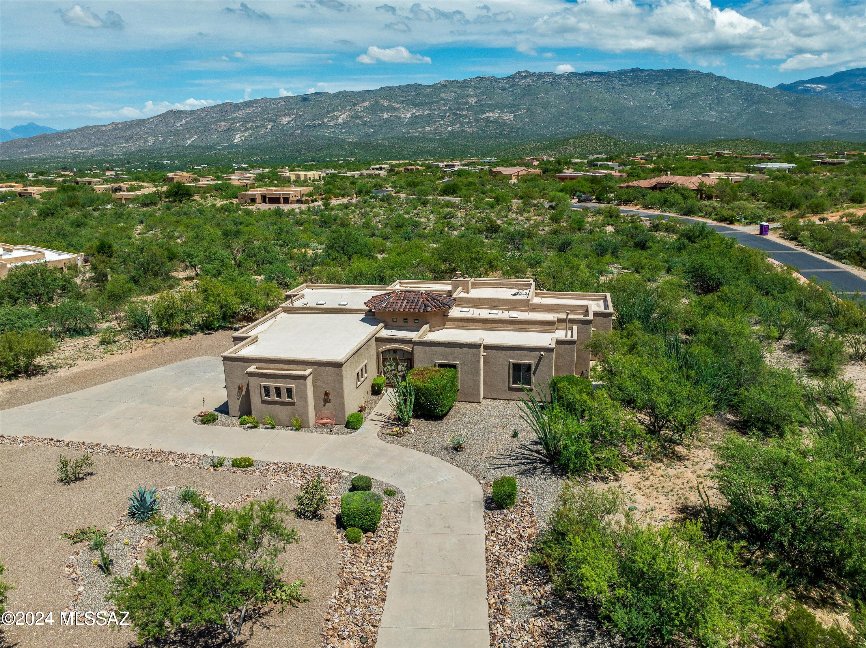 Welcome to your desert oasis located in the highly sought after equestrian community of Coyote Creek! Situated on nearly 2 acres, this property offers breathtaking mountain views from the moment you step through door. The expansive outdoor space is an entertainer's delight, featuring a built-in grill and sparkling pool perfect for cooling off on warm desert days. Inside, you'll find a blend of comfort and luxury with spacious living areas that flow seamlessly. Whether you're lounging by the pool, enjoying the serene landscape, or taking in the stunning views, this home is your perfect desert retreat. Don't miss out on this unique opportunity to own your slice of luxury living!