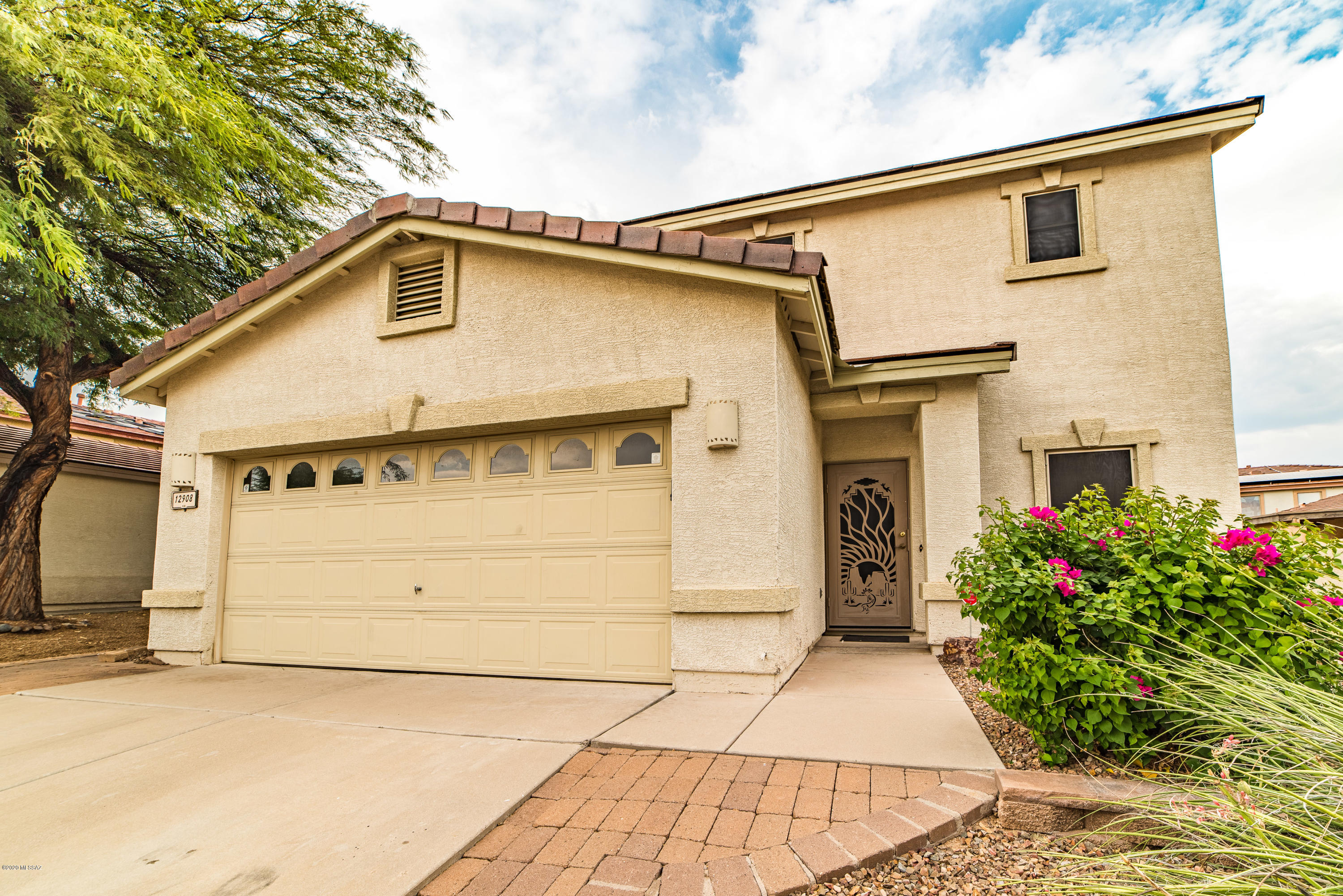This 3 BD/2.5BA/LOFT/POOL/2,011 Sq.Ft In desirable Rancho Vistoso is ready for a new owner. Floorplan offers living & dining area, family room, casual dining space, powder bath, laundry room & kitchen downstairs. Kitchen offers corian counters, plenty of cabinet space & breakfast bar.  Upstairs features a loft w/built-ins, Master suite, 2 guest bedrooms & bath. Master suite is spacious w/dual vanities, tub/shower & walk-in closet. Backyard offers an extended patio, mature landscaping, sparkling pebble tec pool & grass area. Don't miss this great opportunity in Rancho Vistoso!