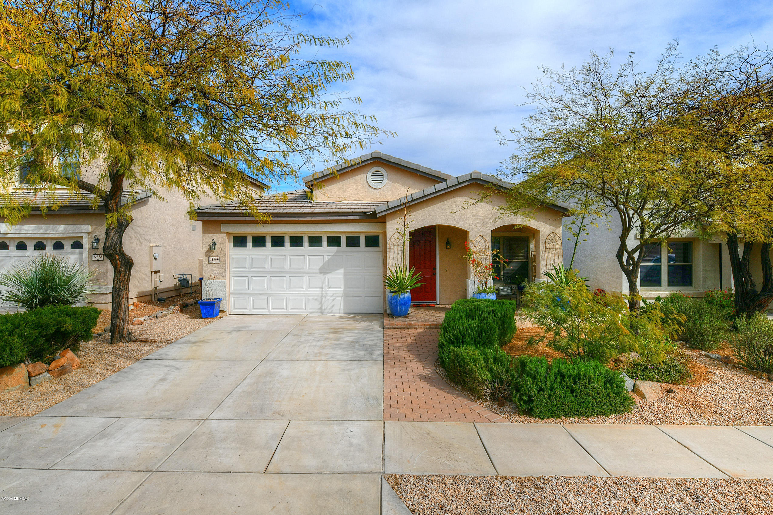 This beautiful home has been well maintained and is move-in ready! Newly painted garage. Over-sized master suite. Kitchen has Corian counter tops, 42 inch Maple cabinets and eat-in area. Quite, peaceful backyard has extended patio with Ramada & low maintenance landscaping.  Don't miss out on this beauty! Come see your new home TODAY!!!