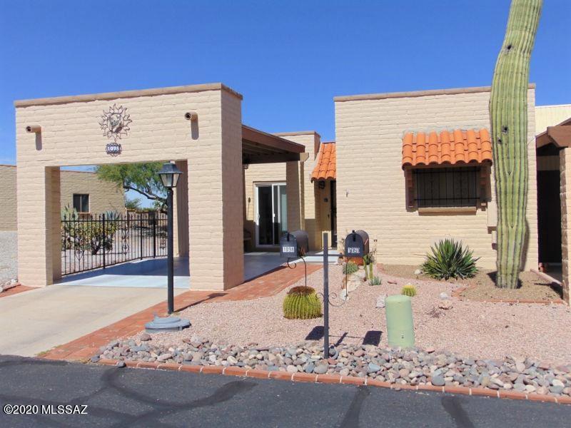 Available for the season (January - April 2021)!! Lovely end-unit townhouse with views of the Santa Rita Mountains from covered back patio.  Nicely furnished with a Southwestern flair. Green Valley Rec is available and property is close to rec centers and golf. This is a 55 and up community.