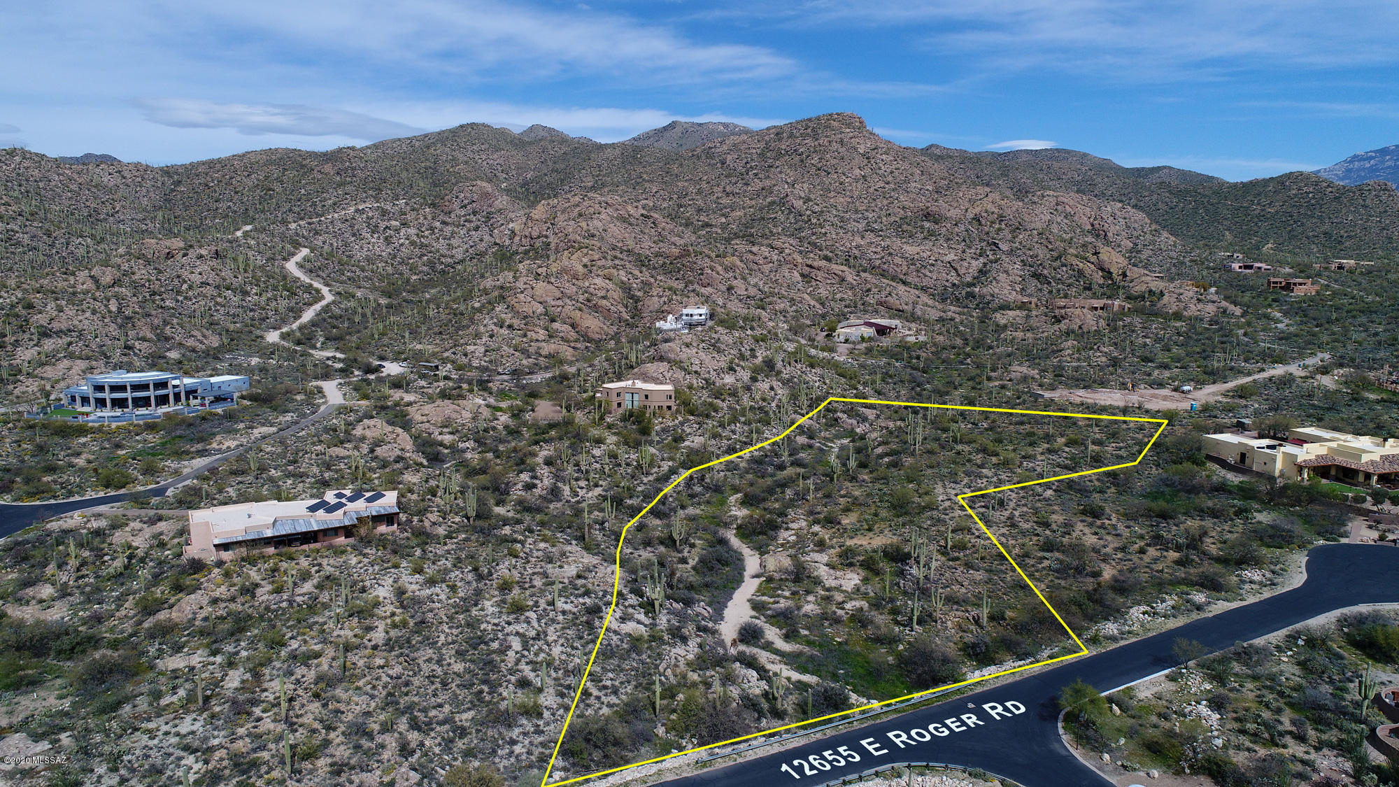 This gorgeous 3.33 acre premier homesite with spectacular mountain, canyon, sunset and lush desert views boasts incredible rock formations that capture your soul and make you truly appreciate the natural order of things.   This easy build lot is located on a secluded cul-de-sac lot in the prestigious Canada Verde gated community of only 10 lots.  This is a fantastic opportunity to find peace and tranquility without giving up all the amenities of normal life that are conveniently close by.   Gas, water and electric available.  Septic required.    Sale includes parcel #205-34-231B also, aerial and plat maps attached.  Seller is a licensed builder with design capabilties.  Seller would entertain a build to suit option.