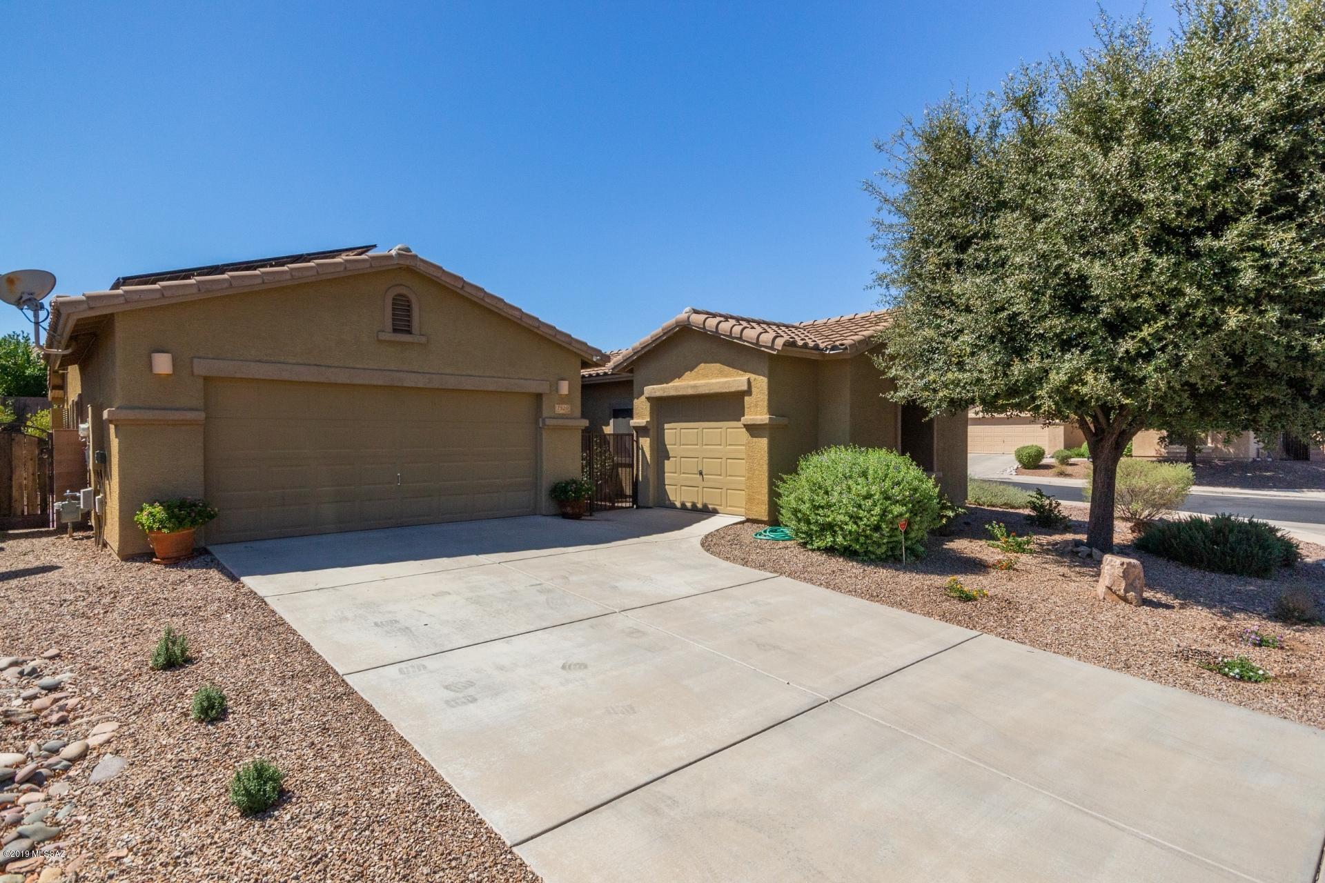 Perfectly maintained home on a corner lot in Continental Reserve. Pride of ownership throughout. Move-in ready. $25,000+ in recent upgrades include: Anderson windows. natural stone floors, covered porch, concrete pavers, custom wrought iron doors and more. Beautiful travertine stone floors in common areas. Open kitchen w/ granite counters & premium stainless steel appliances included. 3 car garage! Backyard is an entertaining paradise. Built-in BBQ, waterfall, wooden deck wraps around sparkling above ground pool. Professionally landscaped. High block walls for privacy. Mountain views of Sombrero Peak. Tesla Solar Panels leased, provide virtually 100% of the home's electrical needs. Home warranty included! An exceptional home. Must see to appreciate all the thoughtful touches and elegance.
