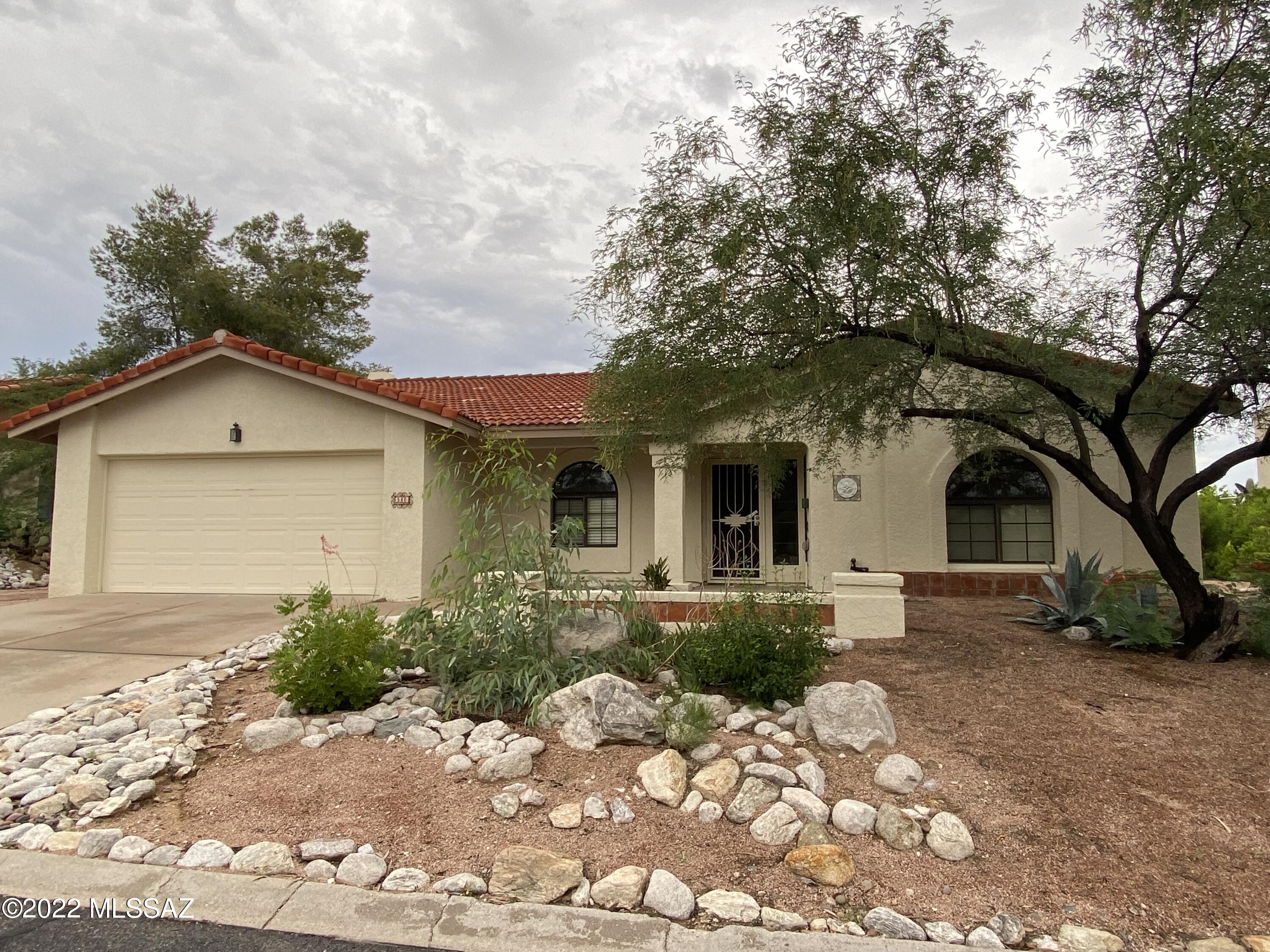 Spacious 3 Br 2 Ba Formal Home on oversized lot. Separate Family/Great Room open to Kitchen, Eat in Breakfast Nook, large Prep countertop also serves as eat bar counter. Formal Dining and Living Rooms. Exterior Alcove off Kitchen and Master Br. leads to large covered rear patio with mountain and Sunrise Views. Extra large rear yard. Master Suite with walk in closet , Garden Tub and separate shower. This Home affords Mountain and Sunrise views with close proximity to Sabino Canyons Hiking/ Walking/ Biking Trails. near all conveniences, Shopping, Golfing and Dining. Carpet and Tile throughout this comfortable living home. 2 Car Garage. Central AC. Fireplace in Great Room.