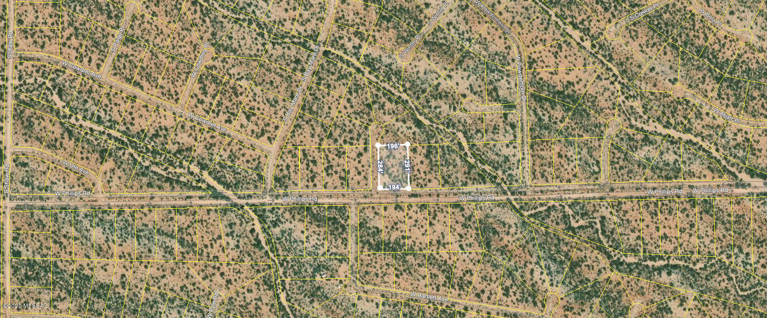 Here is your chance to own level parcel with fantastic views of the Sierrita Mountains and Kitt Peak. Build your dream home on one and put a tiny home or mobile home on the other for family, friends, or rent income. Extremely private and away from city lights.