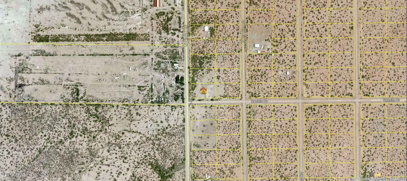 Nice lot with power, septic and a well. On the corner of Circle I & Saddle Dr. Site built homes only due to CC& R's. Nice area, not far from town. Great views and owner will carry ! Great buy. Well needs a pump and pressure tank . Septic being sold in as is condition.