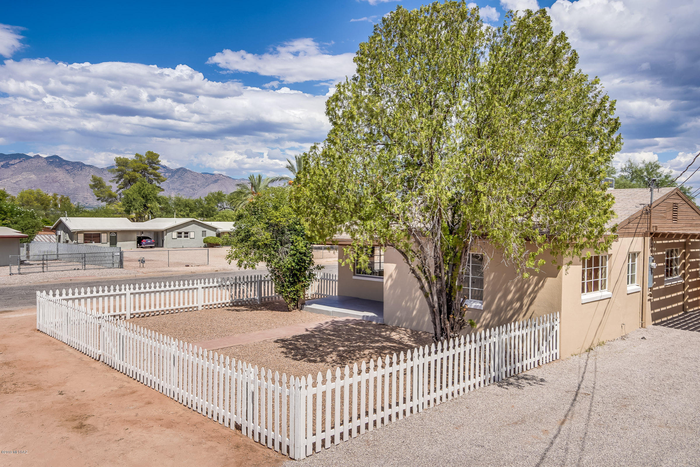 Gorgeous remodeled home in a well-maintained subdivision conveniently located in central Tucson. Character and charm abound in this 1947 home with all the amenities required of today's most discriminating buyers. Concrete floors, granite countertops, open concept with huge island/breakfast bar. The attention to detail in this home shines through. The corner lot provides Catalina mountain views from the north side of the home and backyard. Easy commute to downtown and the U of A. Owner is a licensed real estate agent in Arizona.