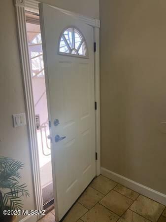 Very private single family home tucked away in a wonderful residential neighborhood close to Speedway and Country Club. Modern kitchen with gas stove. Travertine tile throughout living areas and carpet in bedrooms. Central air. Walled yard with mature shade trees and covered patio. Close to The Loft Cinema, Whole Foods, Jersey Mike's and much more.