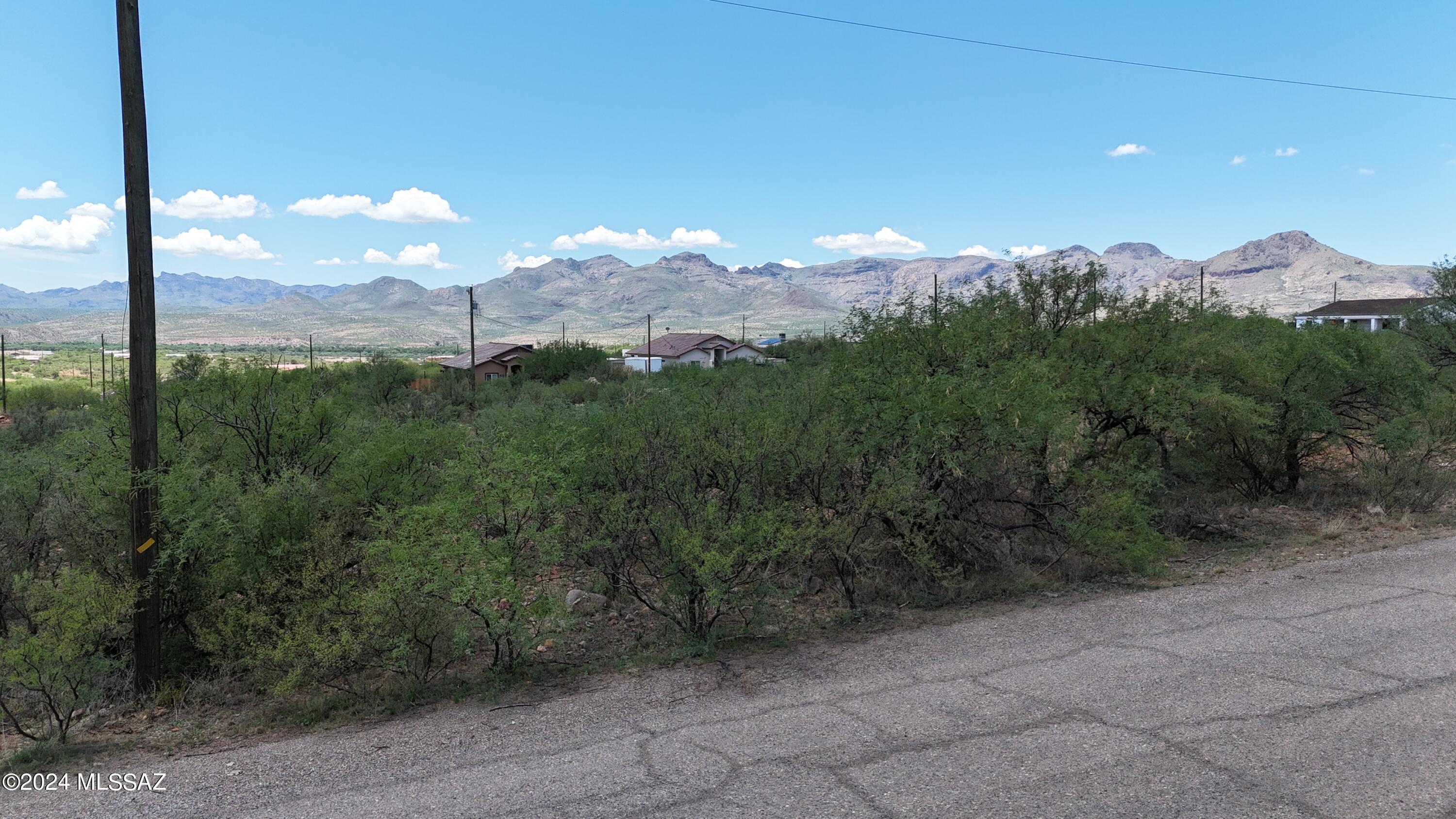 Flat building lot, all paved access.  Electric service at the street.  Water should be verified with water co.  Mountain views.