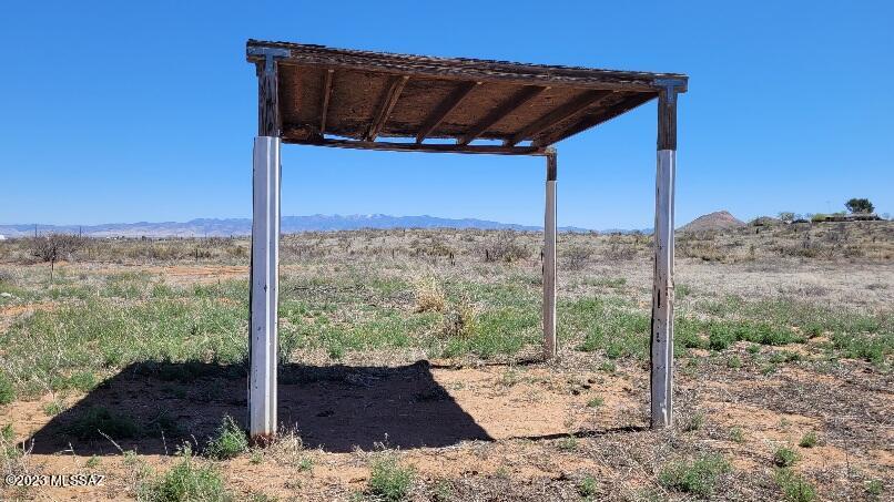Just under 5 ACRES (4.9 acres), level with Sunizona Water hookup available, septic already installed and under-ground power!  The septic needs a new tank. Have a $6k estimate.  Partially fenced.  Lovely mountain views.  1/4 mile to Sandy's restaurant with some great home cookin'!  There was a MFG home on the property but it was damaged and has been removed and all the debris is clean up. Get out of the city and come enjoy the quiet life in the country with good neighbors!  Cochise County is still a great place to live an uncomplicated life with a slower pace.  This parcel is located in a Flood Zone.  MFG homes are allowed, so typically not too much of a problem with insurance  Priced to sell at $34,900.  Seller might consider financing with large down paymen