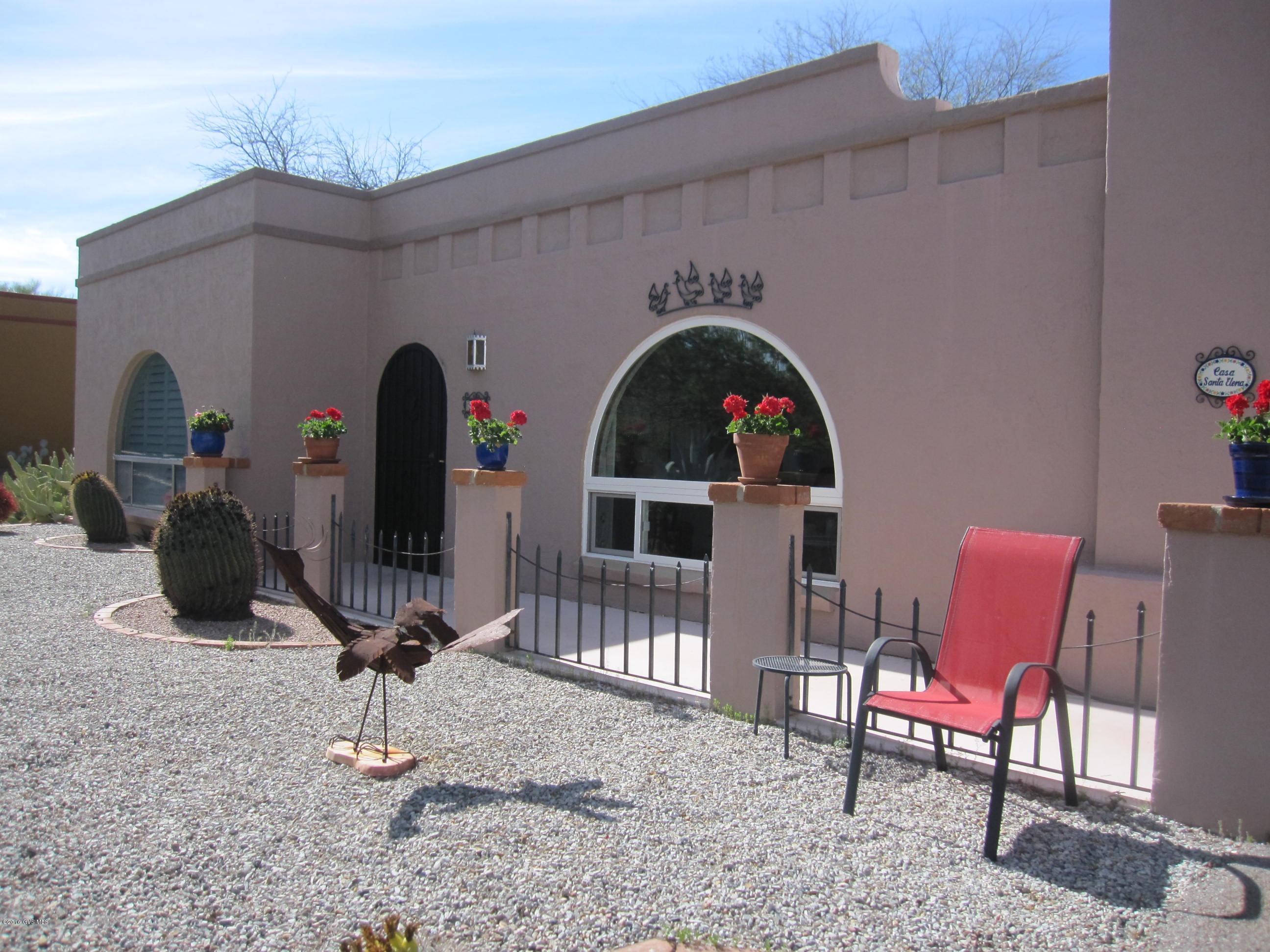 WELCOME TO THE ''HAPPY HOUSE''! THIS CIRCULAR LOT IN LA CANADA DESERT HOMES 1 PROVIDES UNIQUE SPACE, PRIVACY, LUSH COMMON AREAS AND PEACE! GREAT MOUNTAIN VIEWS FROM THE FRONT! LISTEN TO THE BIRDS IN THE BACK! LOTS OF FUN COLORS THROUGHOUT THE HOME AND SPECIAL ''CASITA'' WILL MAKE YOU SMILE! OPEN FLOWING FLOORPLAN. GAS FIREPLACE IN GREATROOM. 2 GORGEOUS ARCHED WINDOWS. WIDE PANEL PLANTATION SHUTTERS THROUGHOUT! CORIAN COUNTERS IN LIGHT-FILLED KITCHEN! CHEERFUL HALL BATH WITH BRIGHTLY COLORED TILE COUNTERS! SEPARATE ENTRANCE ''CASITA'' ROOM EXCELLENT FOR CRAFTS, ADDED GUEST ROOM, DEN OR ''MAN CAVE''! SPIC AND SPAN GARAGE WITH WORKBENCH. BRICK PAVERS ON THE SPACIOUS BACK YARD MAKE ENTERTAINING TRULY EASY! LOCATED IN THE CENTRAL PART OF TOWN NEAR SHOPPING, RESTAURANTS. 2-10 HOM