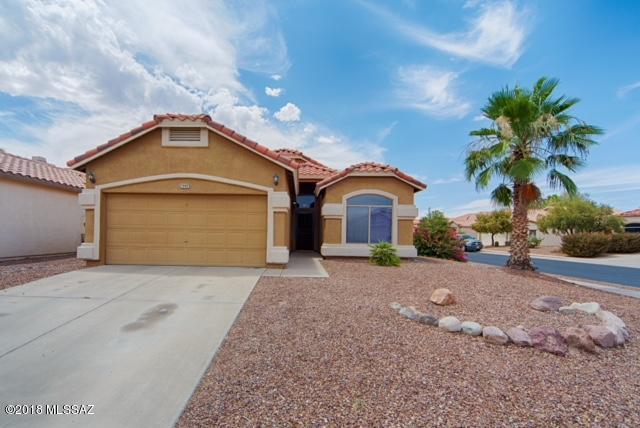 Lovely 3 bedroom, 2 bath home on corner lot.  Living room, dining area, Master bedroom with walk-in closed, dual sinks, enclosed backyard, a/c and water purification system. this home will provide a courtesy washer and dryer.  This home is a No Pet Property.