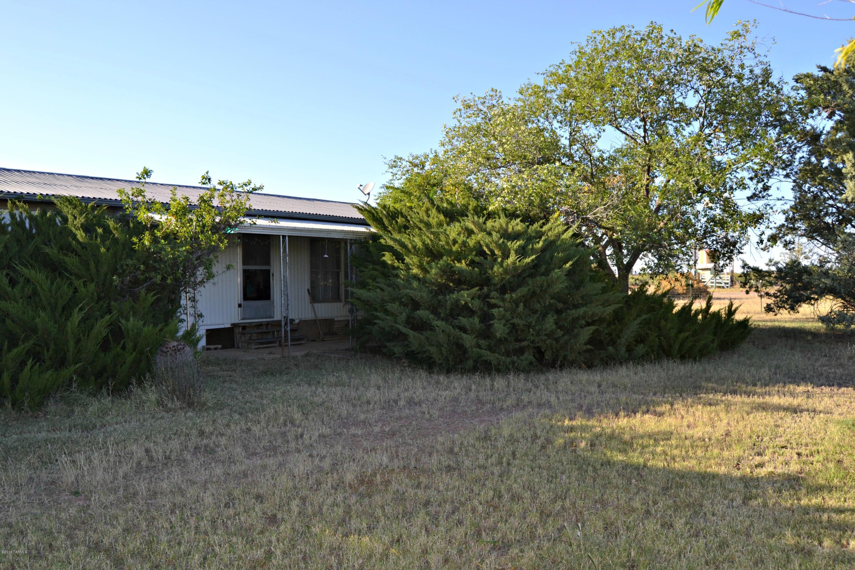 Country living at its best with EVERYTHING already set up! This 19 acre property has all the work done for you to bring your animals, to
include:2 hay barns, tack shed, 4 chicken coops, shades, 2 wells, grazing pasture, several fenced areas including yard around home for dogs. Carport and 30'x30' large shop for storage PLUS a
basement that would make a great work area. Electric is in almost all the outbuildings. Mature trees: pear, apple, apricot, pecan and more! Inside this
incredibly well maintained home you will find a large living room area with large windows to let lots of light in and a great open concept from kitchen to family room.
Large closets and tons of storage making this a very practical home. You have got to see this home for yourself as there are so many great features!