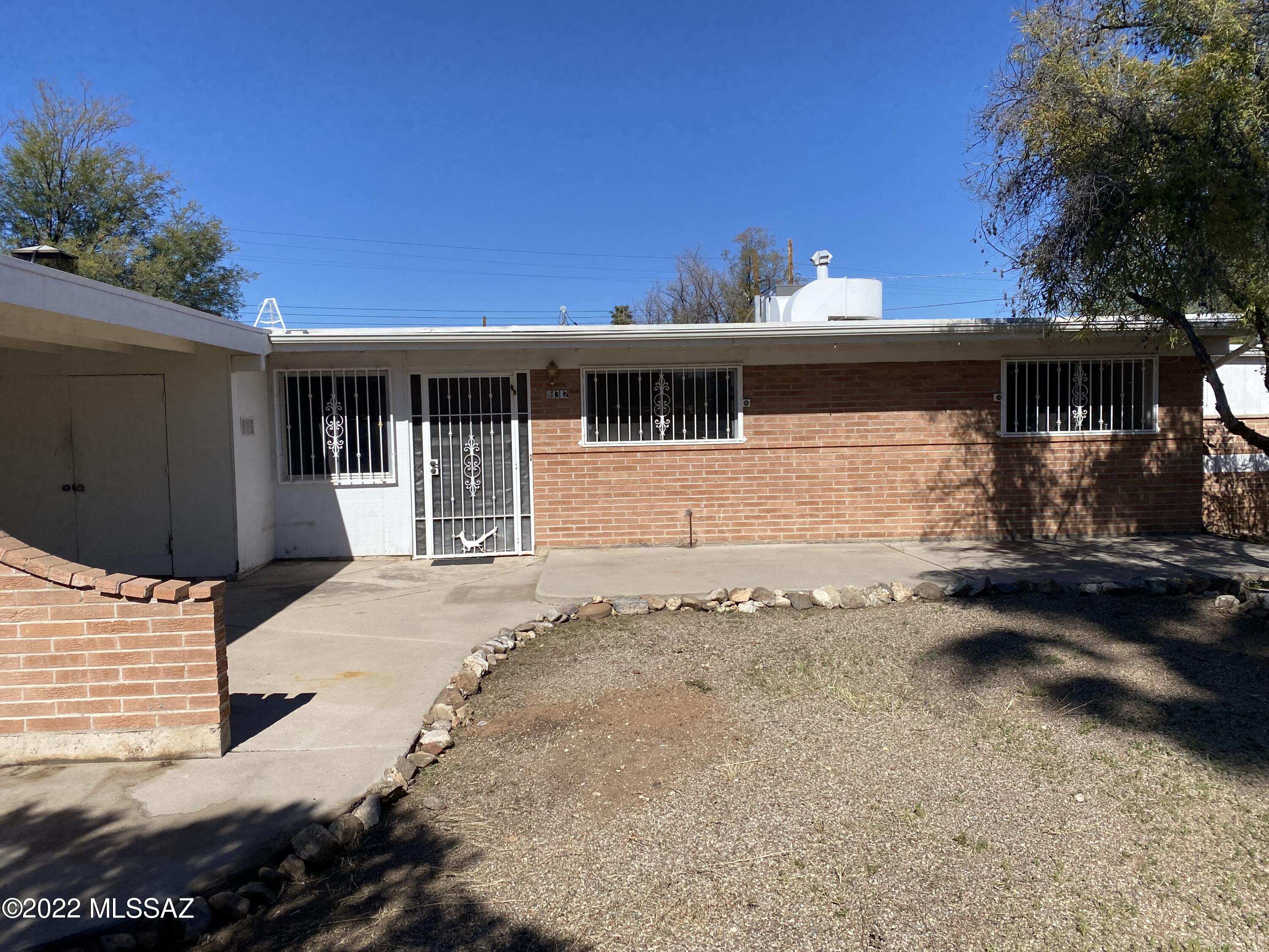 3 bed, 2 bath home with large backyard and 2 car carport.