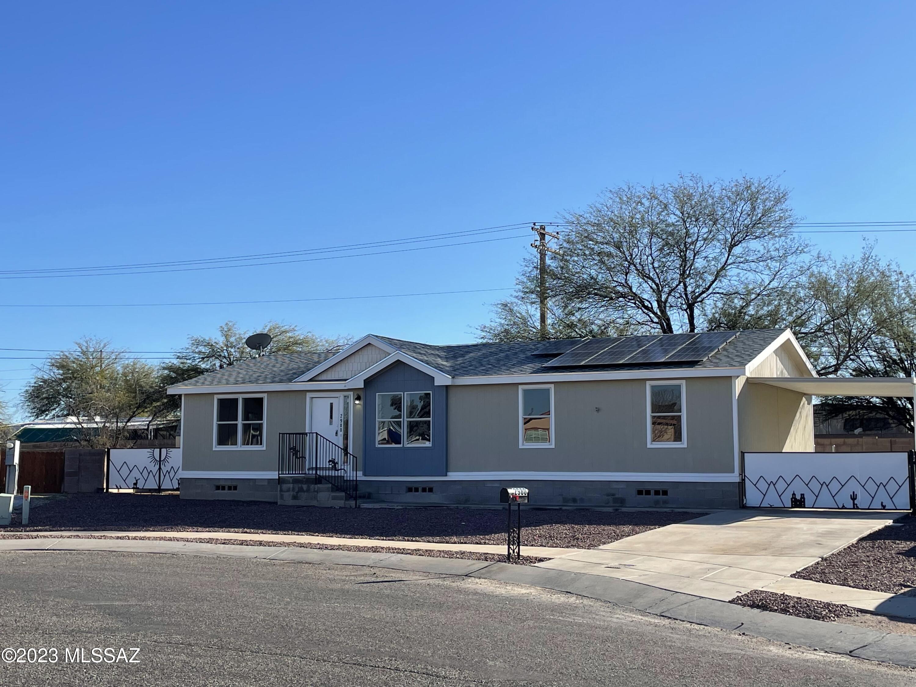 Beautifully remodeled Manufactured home.  Rich wood look luxury vinyl plank flooring. Remodeled kitchen with SS appliances. Prepaid solar lease, no lease payment, super low electric!  New interior and exterior paint. Updated bathrooms. Owner's suite features walk in closet. \This home shows beautifully.