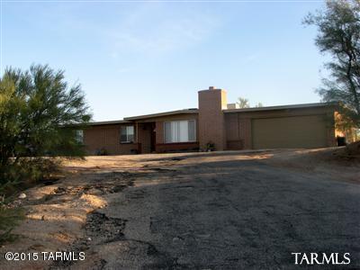 This home has outstanding panorama views, sunrise to sunset on a 1.6 acre lot.  Relax in the sunken living room or lounge in complete privacy on the covered patio.  Home has both A/C and Evaporative cooling.