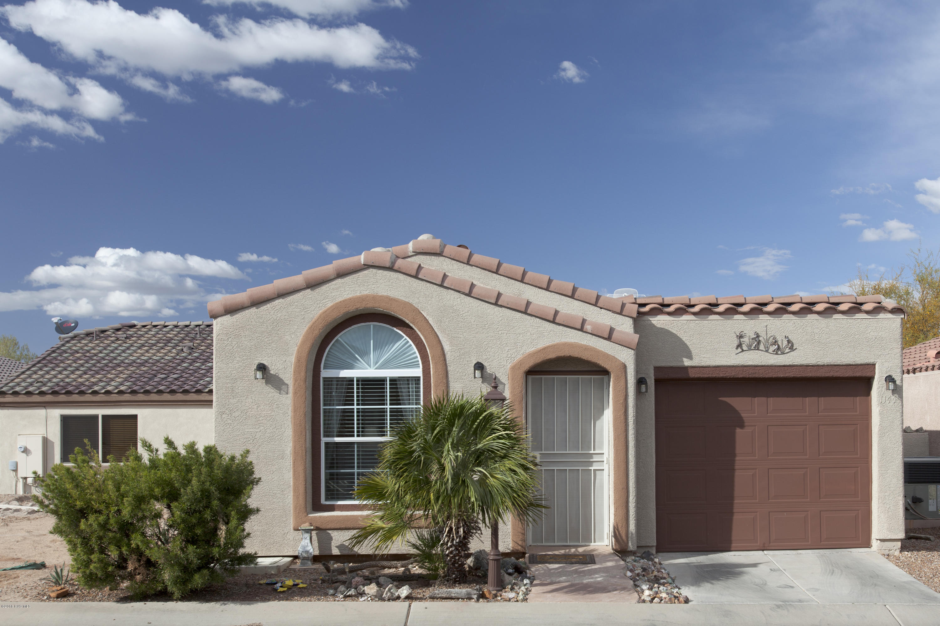 Immaculately maintained snowbird home in Gated Community. Previously remodeled with upgraded carpet and ceramic tile. Den is great for weekend guests featuring ample space for a fold out bed and pocket office. Off den is a custom patio great for barbecuing and pet hangout. This patio is unique to Rancho Resort you can let your pets out on the patio to stretch their legs w/o leashing up and running to the park. Garage to store car and toys. Garage doesn't get hot either so you can rest assured your car isn't getting baked. Perfect sized home can be cleaned in 30 minutes or less. Very easy to maintain and low utilities. Community also features a private clubhouse with pool, exercise facilities, ball room, and much more. This home is only missing you! Put in an offer to