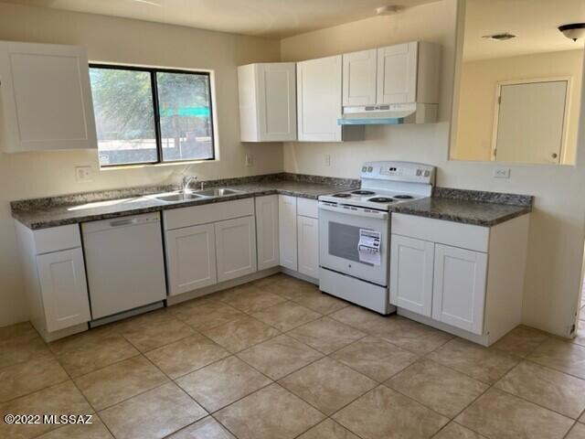 Both Units have been extensively remodeled. NEW, kitchen cabinets, countertops, sink, disposal, appliances. New Bathroom Cabinets, sinks, medicine cabinets, faucets. Depending on unit, tub, shower surround and toilet's all new. Other units may only have new toilet flush valves. New flooring in Unit #2. New water heaters in both. New shut off valves and supply lines in both units. New Front and Back Door's, New door handles. All new lighting fixtures. New thermostat in Unit #2