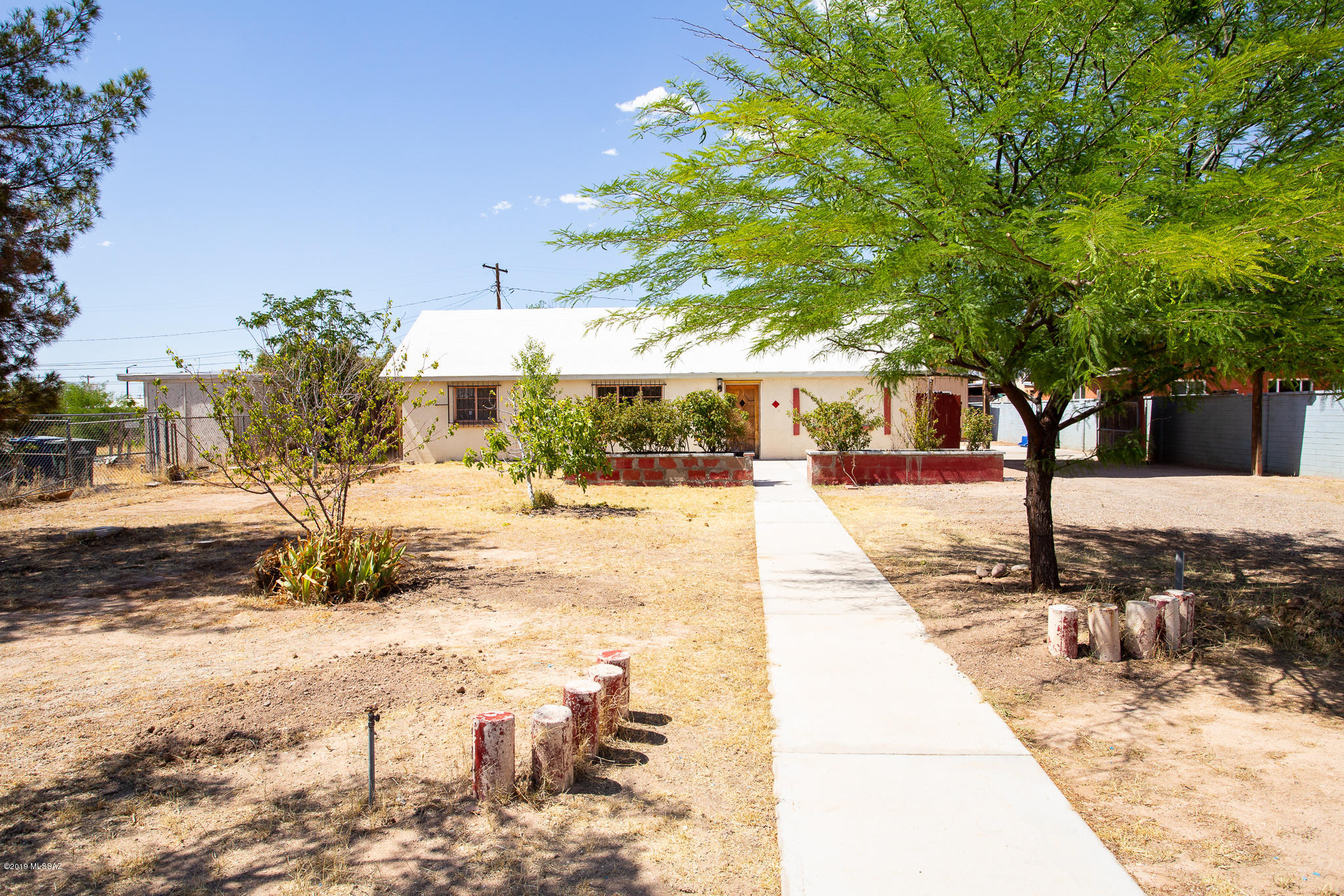 This is a Fannie Mae HomePath Property!  With 1497 sq ft of living space, this home has 3 bedrooms, 2 bathrooms, large backyard with covered patio & storage/workshop building. Spacious kitchen with dining area. Centrally located close to shopping, restaurants, schools and much more!  Attention First Time Buyers: complete the HomePath Ready Buyer homeownership course. Attach certificate to offer and request up to 3% closing cost assistance. Ask Agent for more details. Restrictions apply.