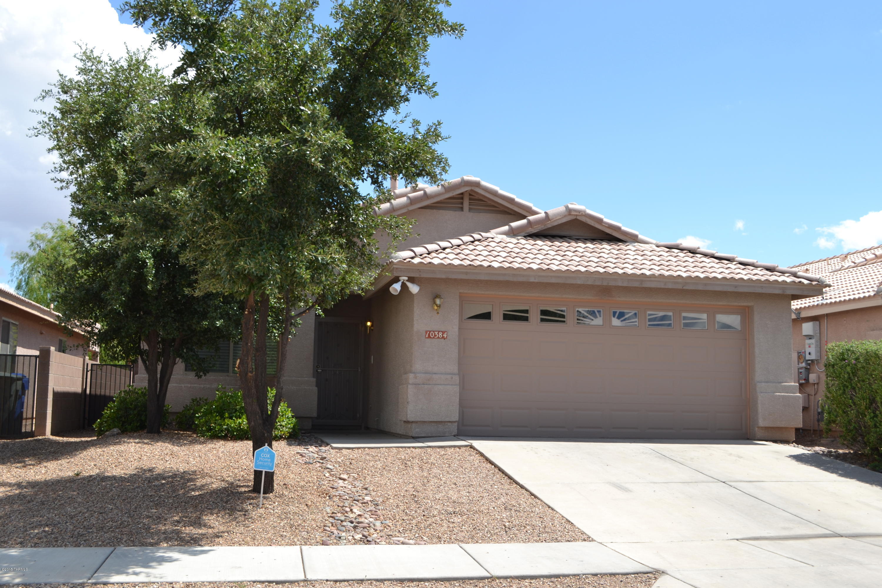 Move in ready! Located in highly sought-after Vail School District. This lovely 3BR, 2 BA former model has many upgrades and numerous designer touches. Spacious great room, eat-in kitchen plus breakfast bar and pantry, newer Dishwasher and Microwave, ceiling fans throughout, garden tub, covered patio, and large south-facing back yard! Community features pool and jogging path. Convenient to I-10, Raytheon, restaurants, shops, and schools.