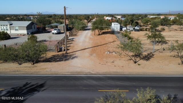 Flat lots (there are 4 total) off Picture Rocks with a new drilled well supplying 4 lots. Seller has just completed a Minor Land Division so description will show 4+ acres. See in Documents, the map and lot layout. These lots will not last. Owner has applied for power to service all 4 lots and the new well. Restrictions will be, manufactured home must be no older than 10 years old. Easy CC&R's, No HOA so bring your toys. Next to state land.