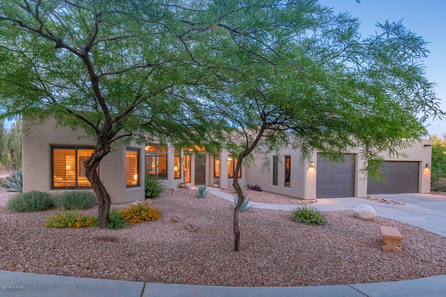 Unobstructed Catalina Mountain views from this 2,806sf (4BD+den) home situated on a cul-de-sac lot in the heart of Oro Valley. No neighbors behind. Walk into this beautiful home and find over sized windows maximizing the mountain views throughout. Open concept chef's kitchen with quartz counter-tops, SS appliances, upgraded hickory cabinets and plenty of storage. Spacious master suite features mountain views and an updated luxury bath with dual closets. Other features include 3 car garage, gorgeous Bellawood flooring, plantation shutters, sunshades, security system and more.  Outdoor living at it finest. Heated Pebble-tec pool w/waterfall spa, professional landscaping and privacy.  Views, views, views!
