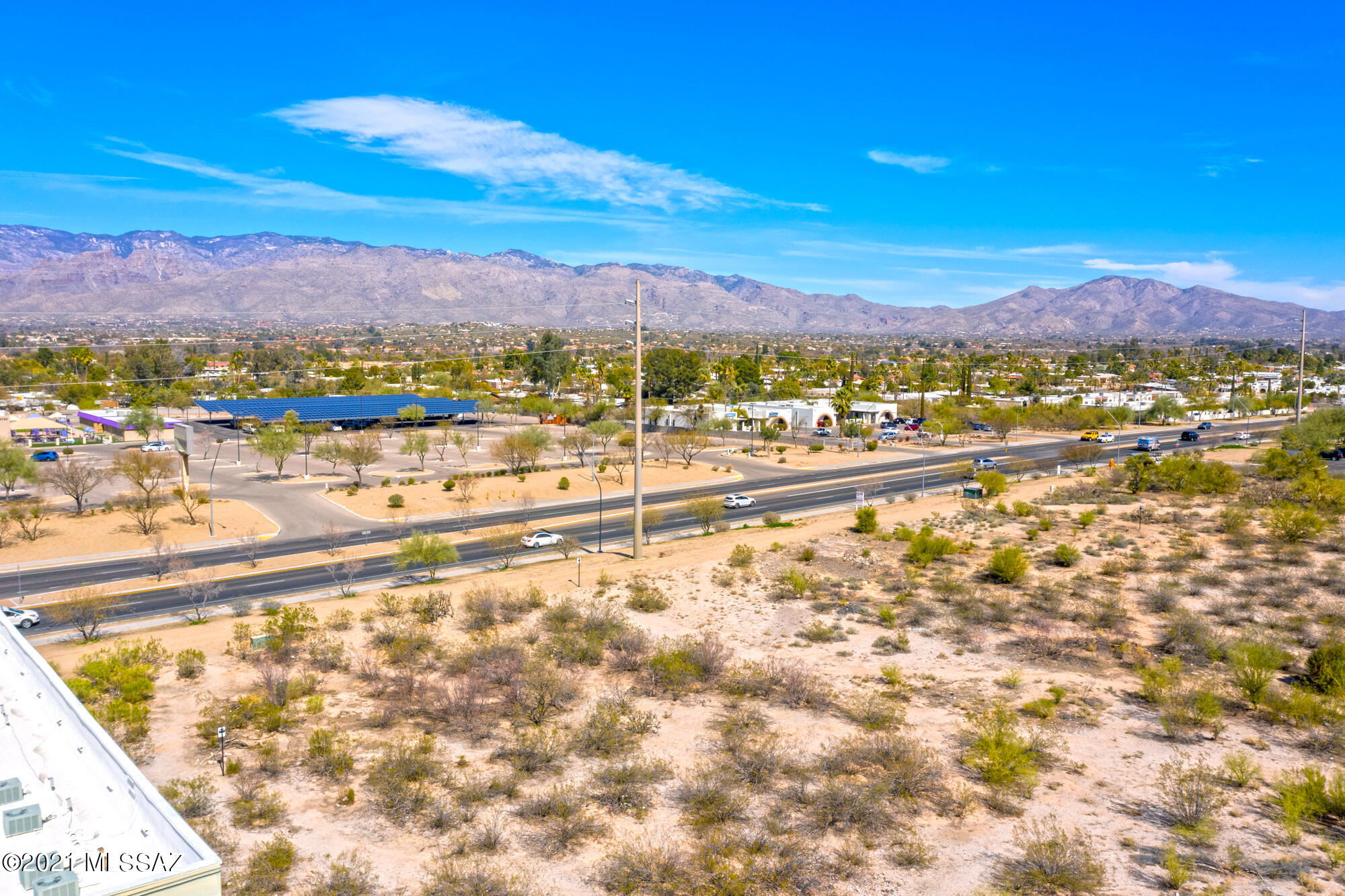 Terrific investment opportunity & major C1 development opportunity on E Speedway. This lot plus adjacent lot (Parcel #133-35-002P) available for total of 2.10 acres. Available separately or combined. There is an existing TEP easement approx 16'x245' between 2 lots.  Utilities at lot line.