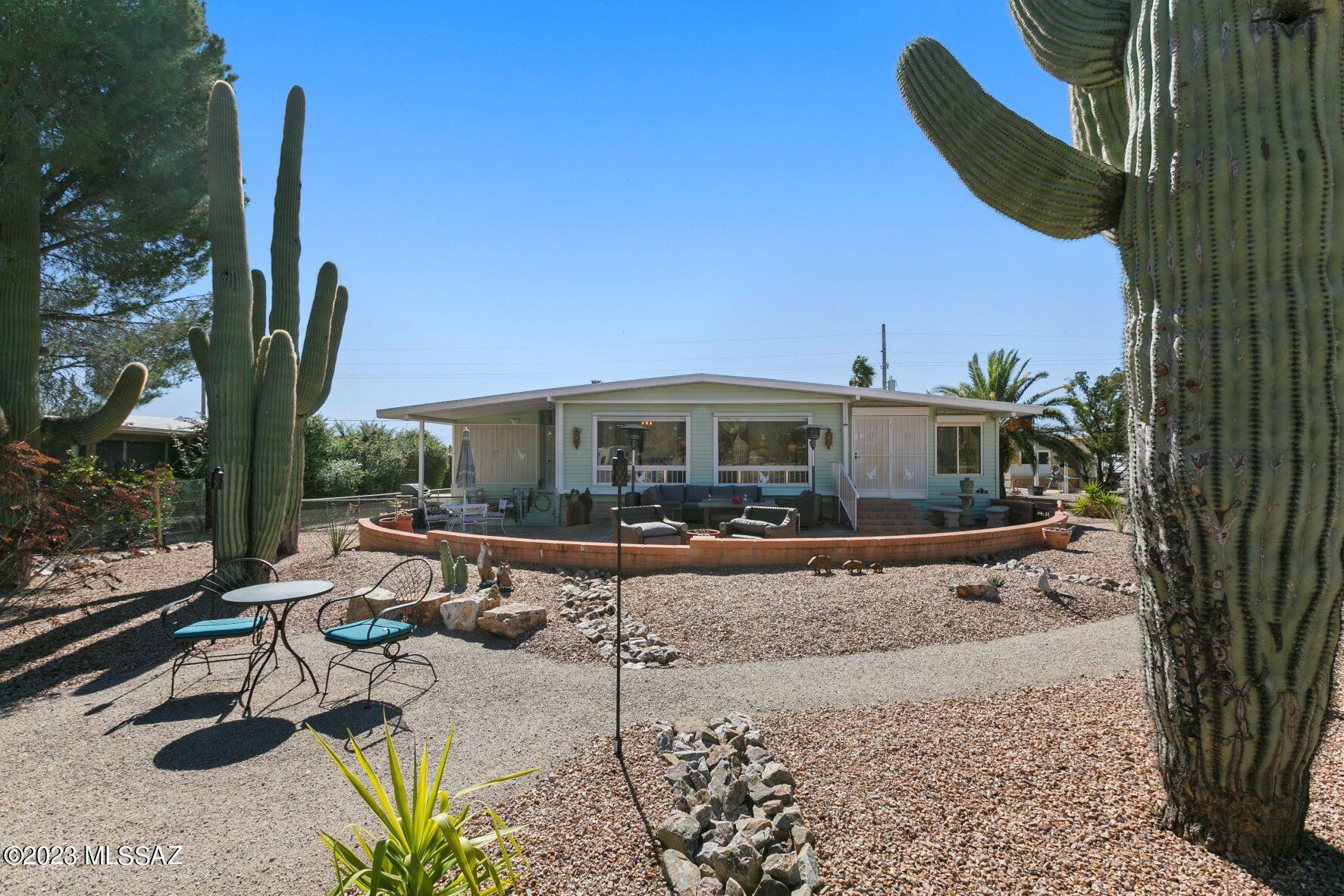 This is your rare opportunity to own a home located on the golf course with unobstructed views of the mountains from your backyard! This mostly furnished home has had electric upgrades, new plumbing throughout, newer furnace and AC, new flooring, and taped and textured walls. Large AZ room on east side of home and large AZ room on west side of home that can be used for multi-purposes. Two large picture windows in the living room beautifully frame your mountain views. The HOA fee includes unlimited golf, tennis, pickle ball, shuffleboard, pools, spa, exercise room, trash collection, and much more. You own the land!