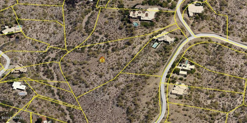 Beautiful exclusive 4 acre lot in Gated Cat 10. Lowest price ever on this spectacular view lot. Best value in this exclusive community. Fantastic location with easy access to River and Campbell corridor.
Building site buffered by riparian areas on all sides. over 31,000 sq. ft. of buildable area. Panoramic views of the Tucson city lights and Catalina Mountains. 

One of the best lots in Catalina Foothills Estates #10.