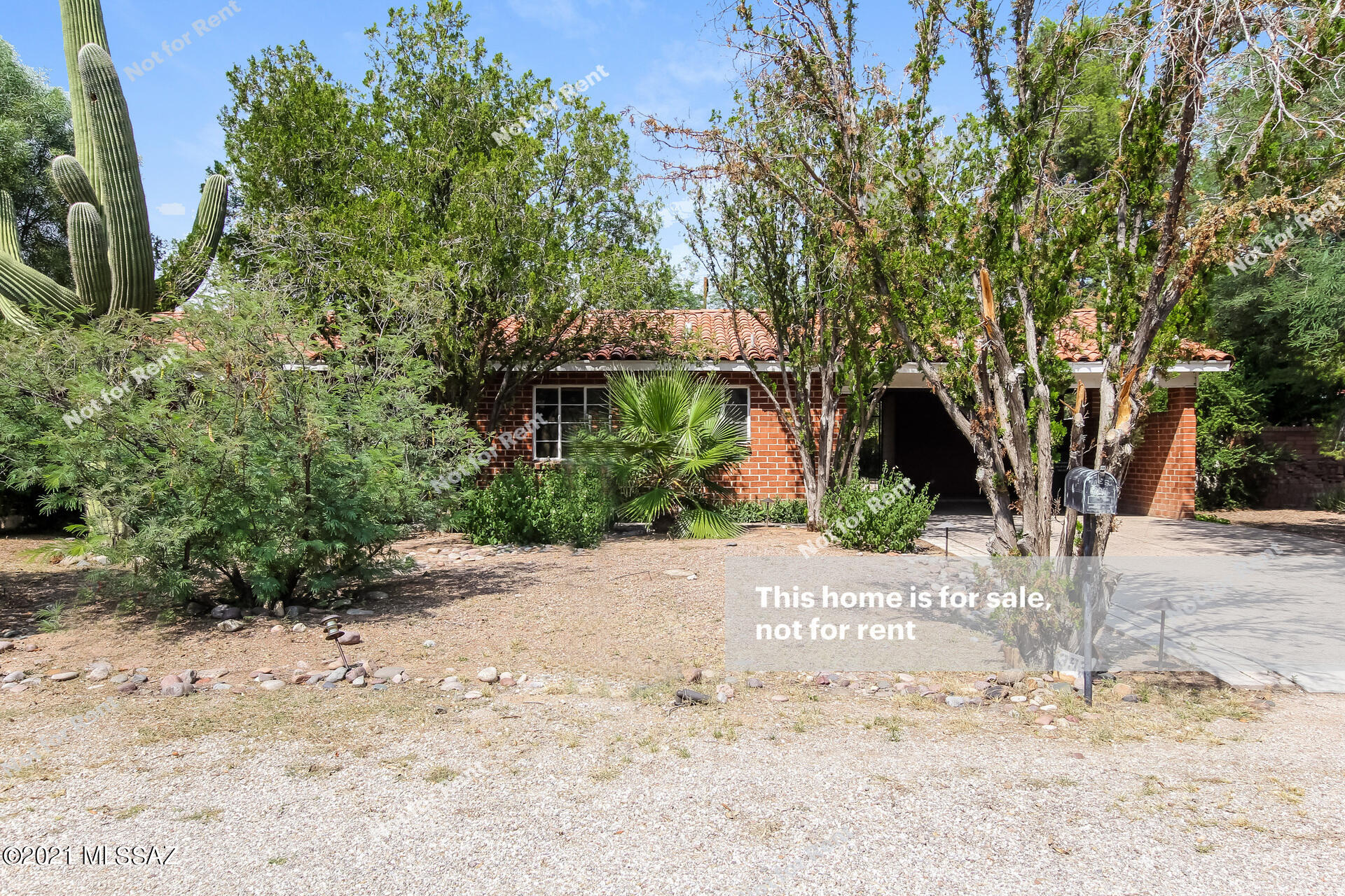 This Tucson one-story home offers a patio.
