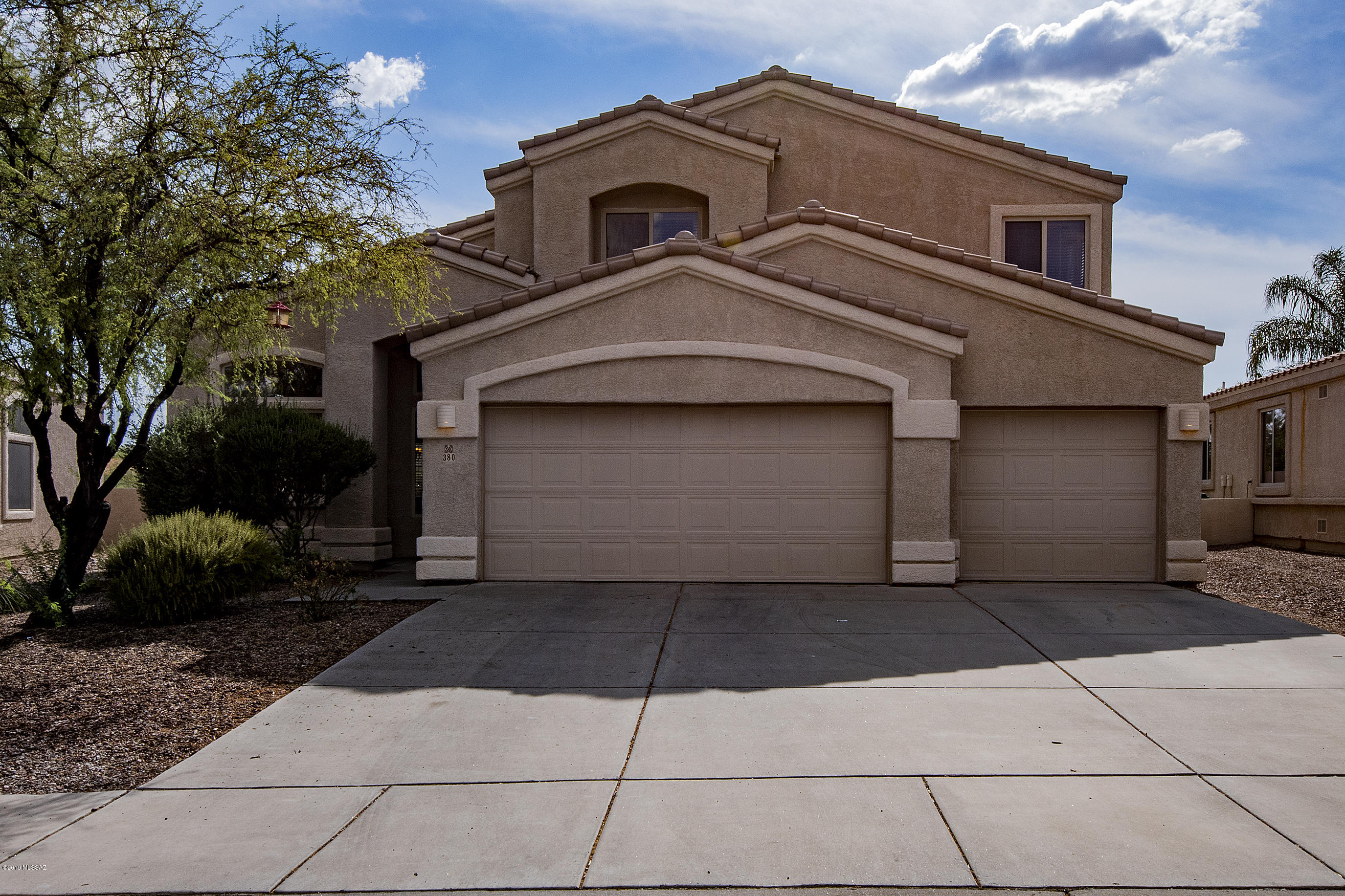 Beautiful home on a cul-de-sac with mountain views and open space behind it in the ever popular Rancho Vistoso Neighborhood in Oro Valley! 2,832 s/f, 4 large bedrooms,  2.5 baths plus a den / bonus room downstairs. Great flow to the floor plan - Formal living, formal dining, family room, eat in kitchen with island and work desk.  All new in the kitchen - granite counters, stainless steel appliances, sink, and faucet.  Brand new carpet throughout (upstairs and den downstairs - the rest of the home is tile) This home is on a premium large lot with refreshing pool / spa and large covered patio.