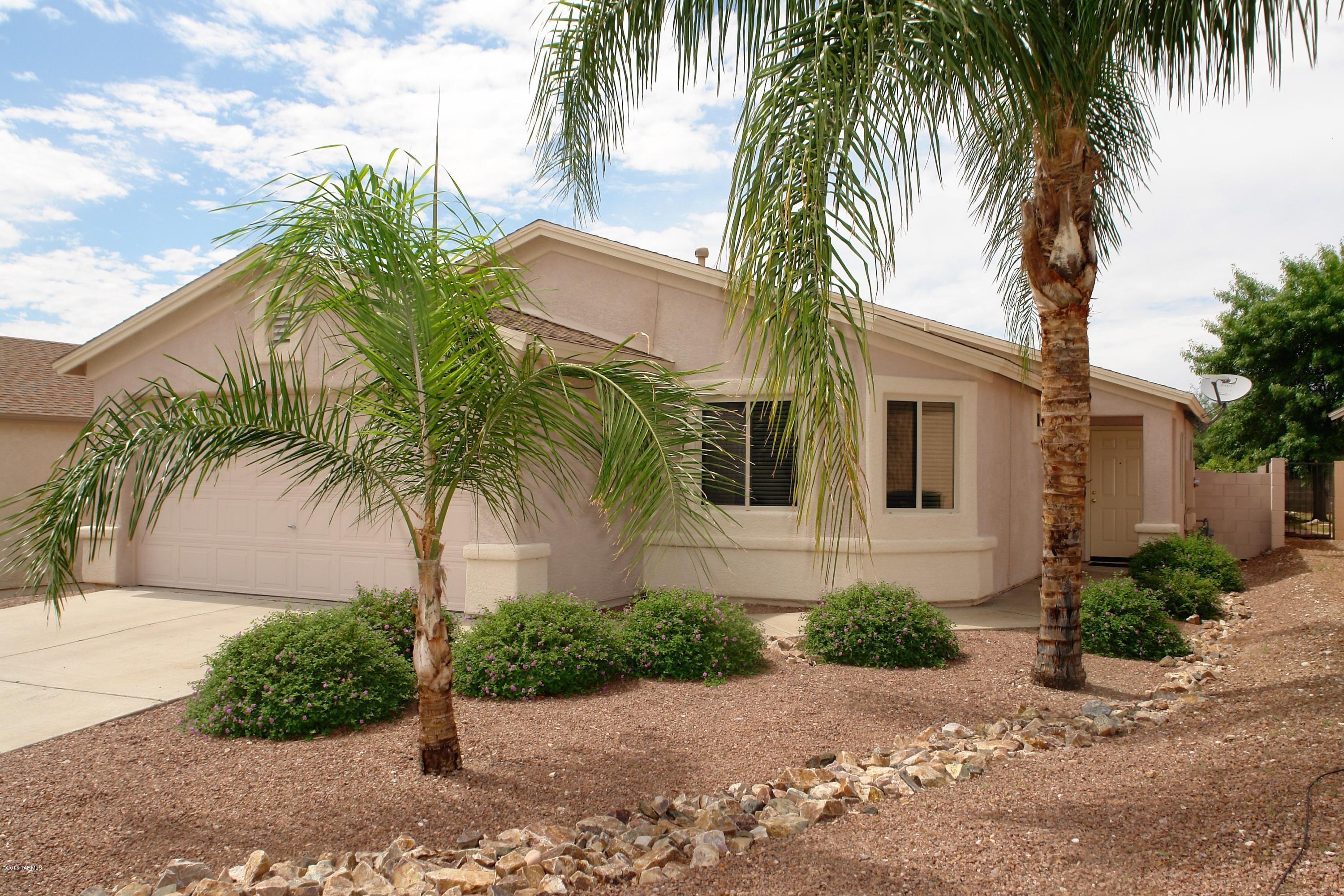 Gorgeous & immaculately maintained home in popular Desert Crossings neighborhood! This immaculate home features one of the most sought after floorplans with great room and split bedroom layout. Very bright & open, this home has plenty of natural light and the vaulted ceilings in the great room add to the spacious feeling.  The master bedroom has attached bath with dual vanities, soaking tub, and separate shower.  Down the hall are two of the guest bedrooms, both with generous closet space & lots of natural light.  The 4th bedroom or den  is located off of the great room making it a great option for home office, music room, play room, or just a 4th bedroom.  The backyard has been professionally landscaped with expansive flagstone patio & just the right amount of grass. Don't Miss This One!