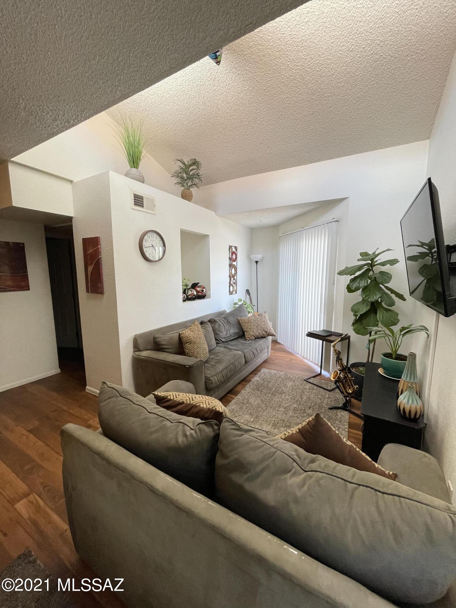 LOCATION LOCATION LOCATION !! Cute upstairs condo located in a gated community just 1.5 miles from UofA and minutes from UMC, next to Tucson trendy N Campbell Av. Walk to restaurants, shops, bus stop, Cat Tran and Mountain Ave. bike route. Amenities include pool, spa, sport court, 24 hrs access to cardio room, Club House, laundry area. 
GATED community. Water, Sewer and Trash are included with HOA fee.