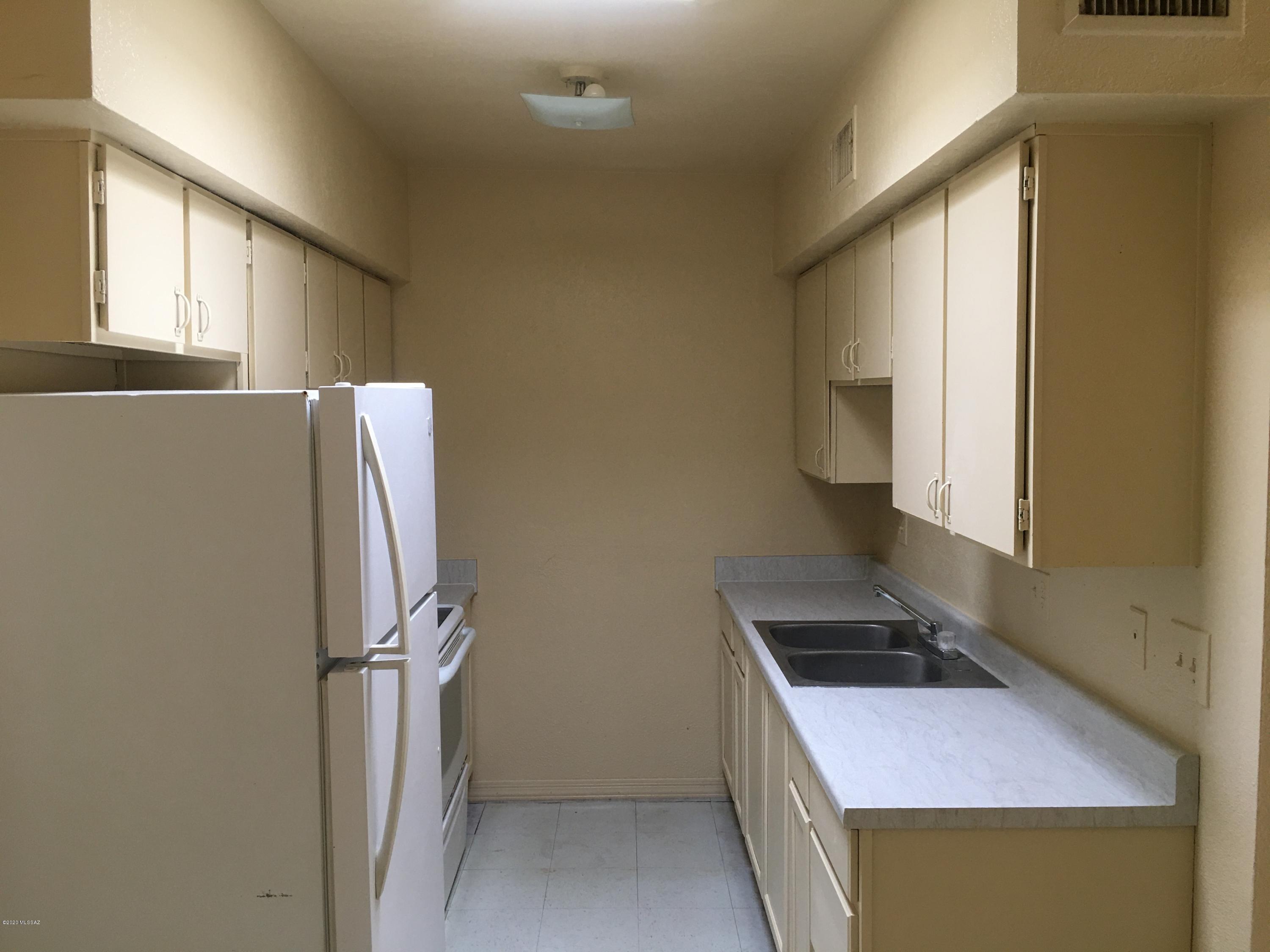 Four 2 bedroom 1 bath units with large living rooms adjacent to dining areas. Galley kitchen. possibility for coin operated laundry in common storage unit. Room to raise rents.