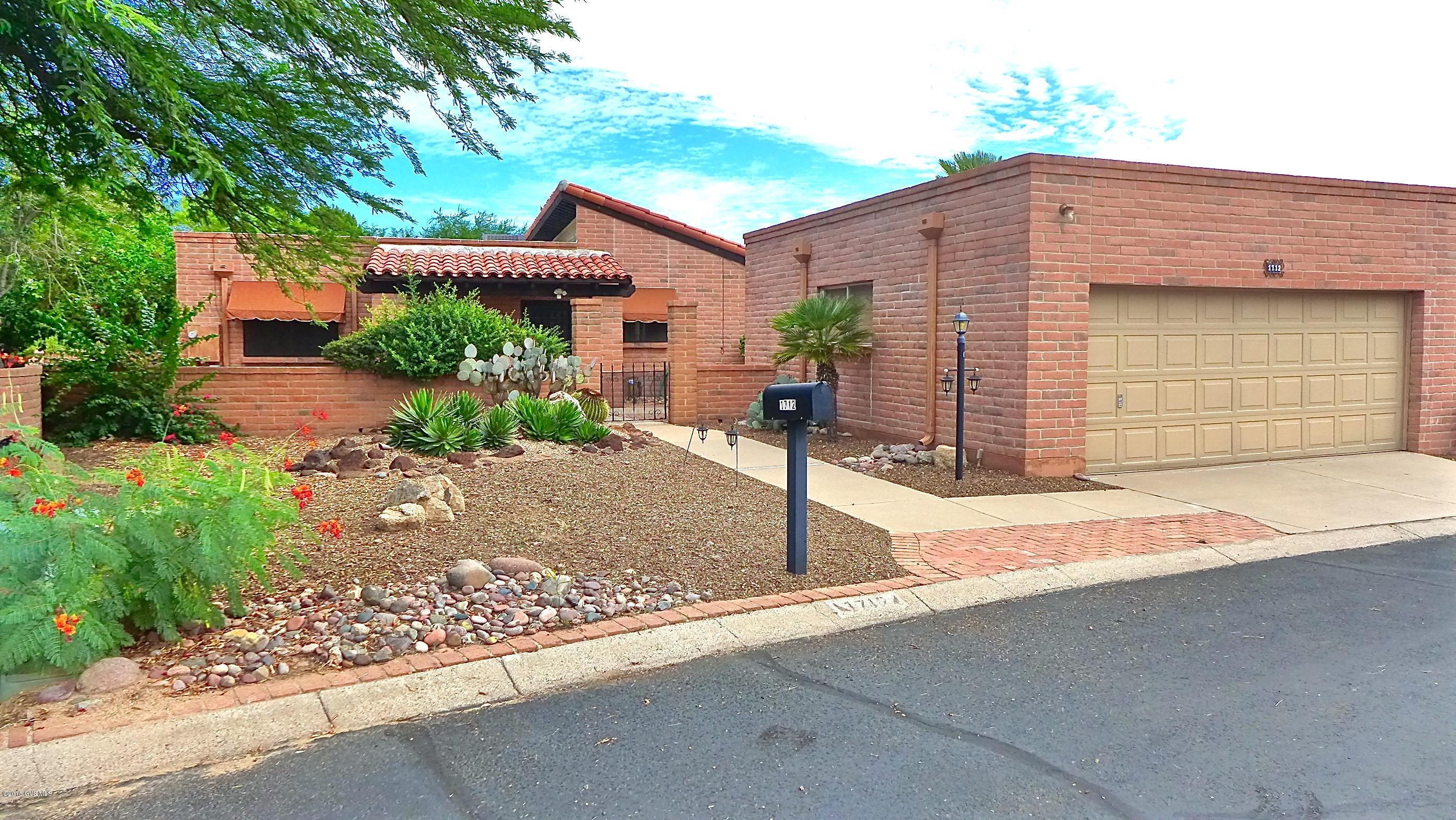 Lovely home has features you wouldn't expect to see at this budget friendly price. They include, like new stainless steel appliances, and both bathrooms have been updated. You'll love the vaulted ceilings, all the windows that bring the light and great outdoors inside, and the screened in AZ room that adds bonus living space to the house. The large kitchen has an outstanding layout and a breakfast nook with a sliding leading to a private covered patio--the perfect spot for your morning coffee. If you love the outdoors you'll enjoy the fact that there are outdoor spaces on all 4 sides of this special place. Whether you are looking for a winter retreat or a full-time home this one fits the bill!
