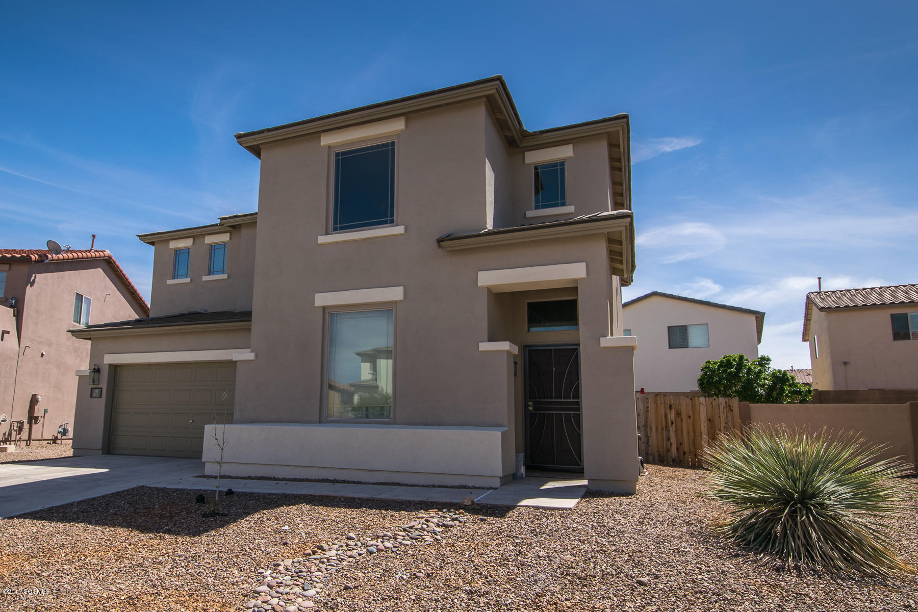 Gorgeous & well maintained home on a quiet street in Rancho Sahuarita. Recently re-painted on the outside this 3bedroom 3bath home is priced to sell! Formal living area which flows into the kitchen&family room W/ fireplace. Beautiful kitchen with lots of counter breakfast bar. Bedrooms are upstairs with a roomy master bath with oversized shower& 2 master sinks. The back yard has pavers but also has a large area that is ready for you to put your own touches, grass, private pool or spa.