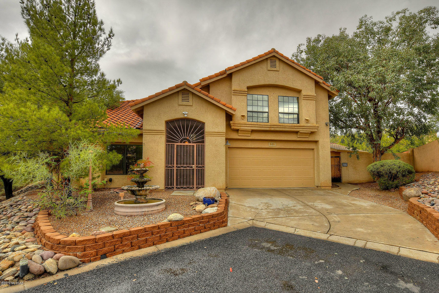 Perfect in so many ways.  At the end of a cul-de-sac, no neighbors behind, and yet close to Sabino Canyon, shopping, restaurants, and schools. A wonderful home that blends a hint of elegance, yet is just so welcoming and livable. Gracious living and dining , fabulous open kitchen and family room, and outdoor living that is unbeatable. Think separate pool, grassy area, screened porch, and charming ramada.  
The master suite is huge with its own balcony, soaking tub surrounded by windows and yet perfectly private. 3 additional bedrooms are all light and bright. BEST FOR LAST! Tucked surprisingly behind french doors is a huge separate workshop/studio/ you decide! This is the newest home in the neighborhood...don't miss it!