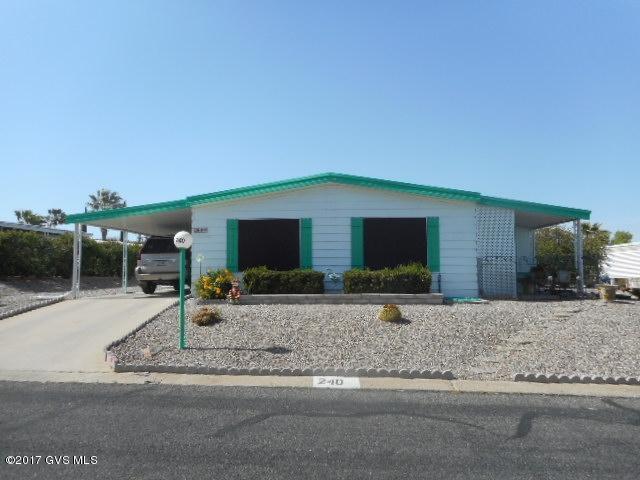 Well maintained home, completely painted in and out. Den off kitchen that has Breakfast Bar, Pantry and Lots of cabinets. Newer Appliances, all flooring replaced, Roof re-coated 2016, A/C motor replaced in Heat Pump 2016, new Water Softener 2014. Solar Screens (2 on front & 1 on side). Total square footage 1392 includes finished Arizona Room (not heated & cooled) with dual pane windows. Covered patio with east mountain views. Westerner Roof System. Large Workshop, 2 Storage Sheds. Under Termite Warranty along with Heating and Cooling Contract. Evap. Cooling Sold ''AS IS'', Great Recreational facilities, heated pool & spa, Library, ceramics, billiards, exercise rooms, shuffle board, horseshoes, etc. HOA only $55.00 mo. Washington Federal will loan on this Home.