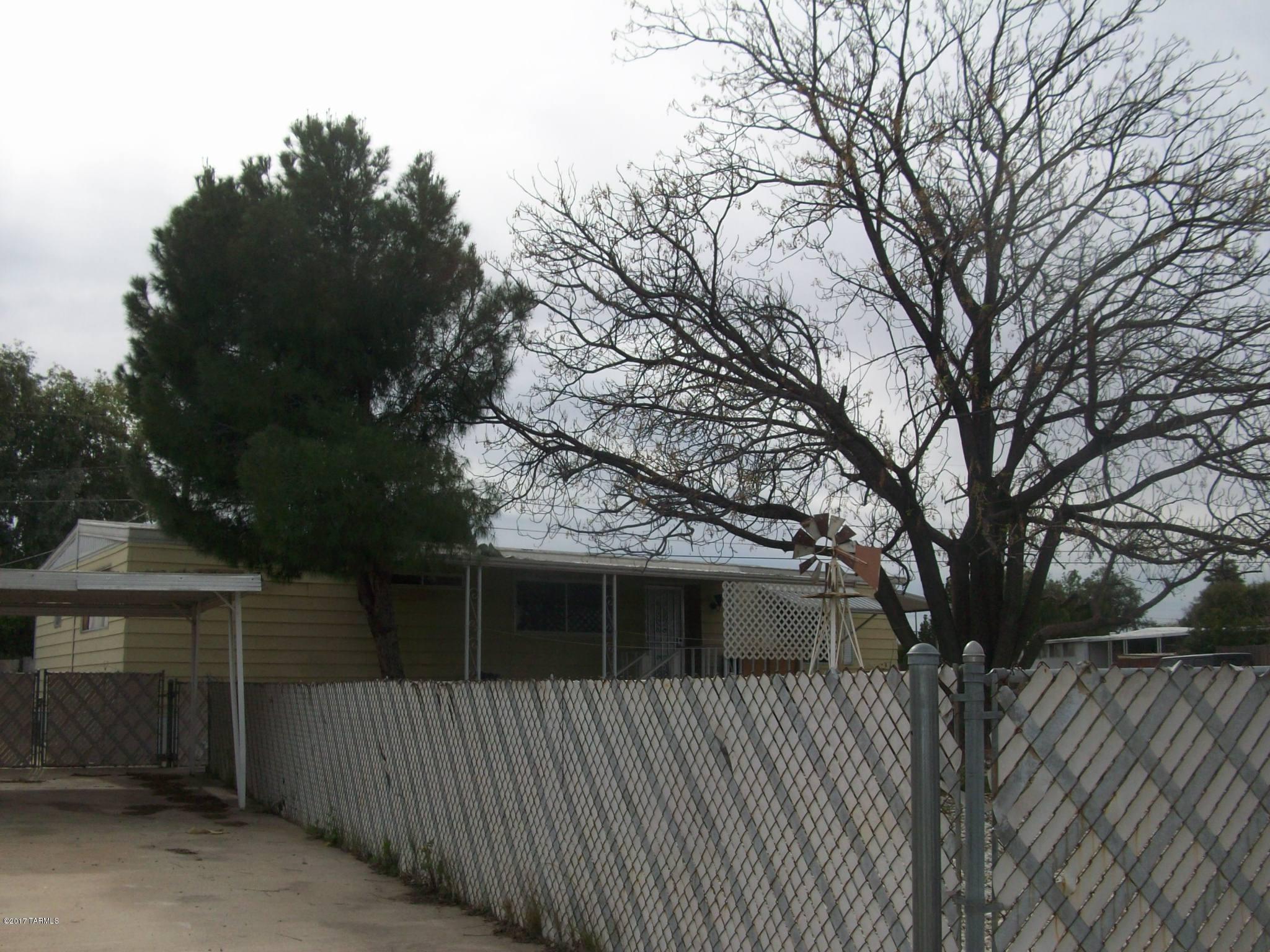 Fix up Double Wide Mobile on large corner lot - needs mechanical and TLC style repairs - great location in Amphi Schools - completely fenced yard.