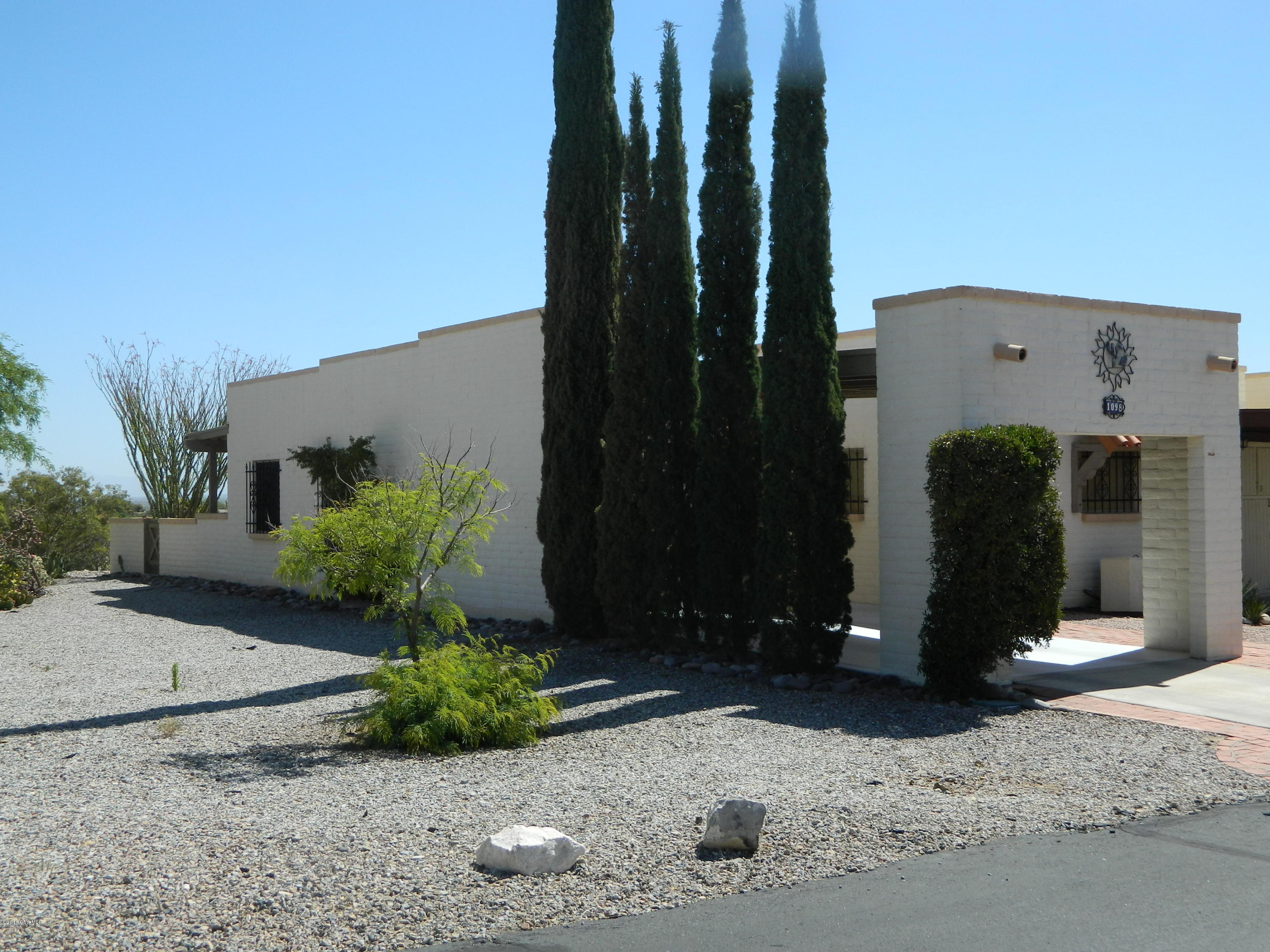 End Unit with large common area beside it. High on a hill with north views of common area, golf course, and mountains. Furniture included SBOS, with a few exclusions; which is all wall art and wall deco, pottery and baskets. Living Room T.V.is negotiable. Newer tile floors, Newer kitchen appliances. A must see home.