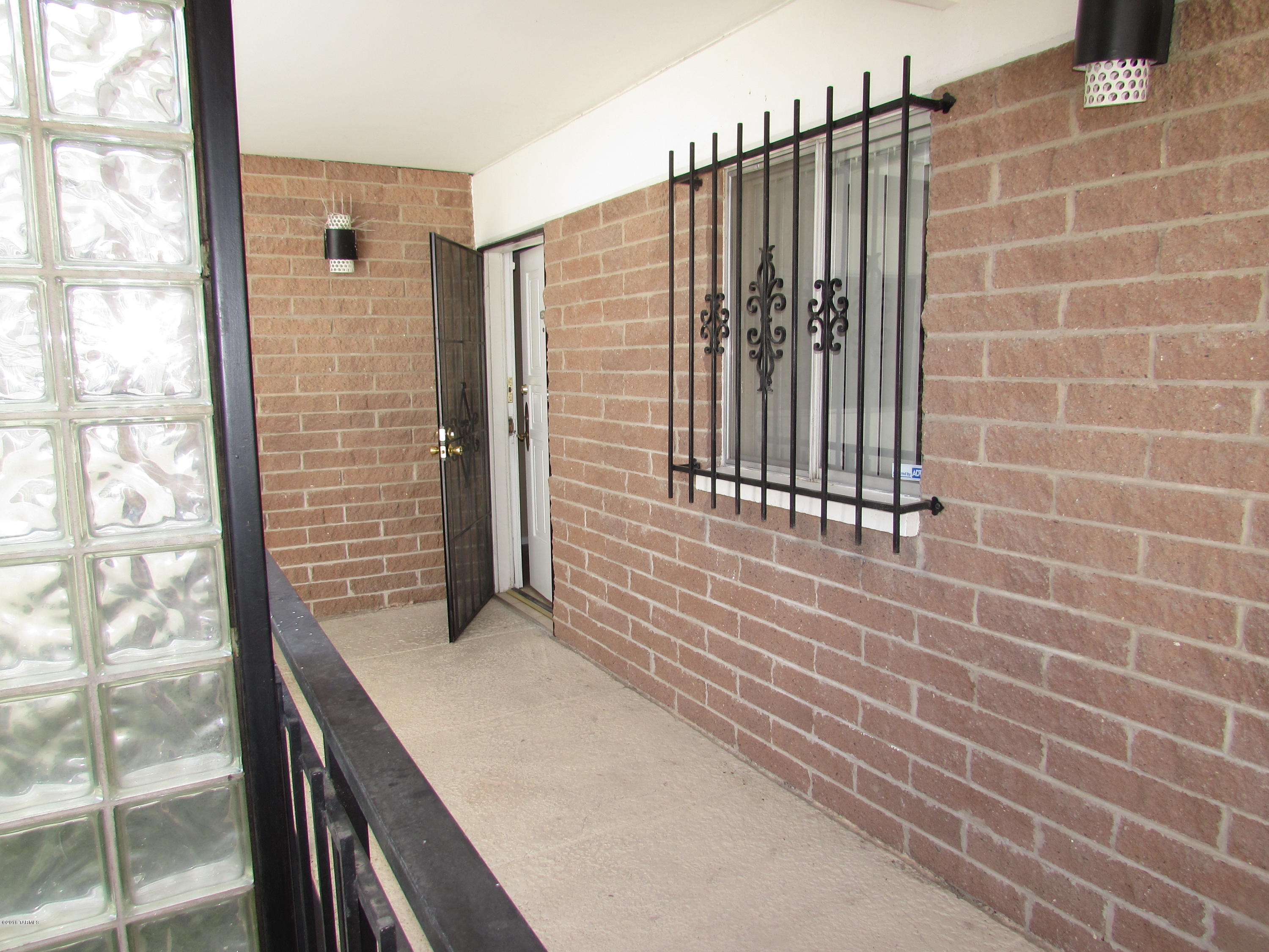 Mid Century completely updated 2nd story condominium in Eden Roc behind the Doubletree by the Tiki fountain.  Great Central location across from Reid Park. Community pool, shared 2 car garage.  Full size washer/Dryer in unit; all rooms are spacious.  Kitchen and baths are remodeled with taste. A special unit conveniently located.